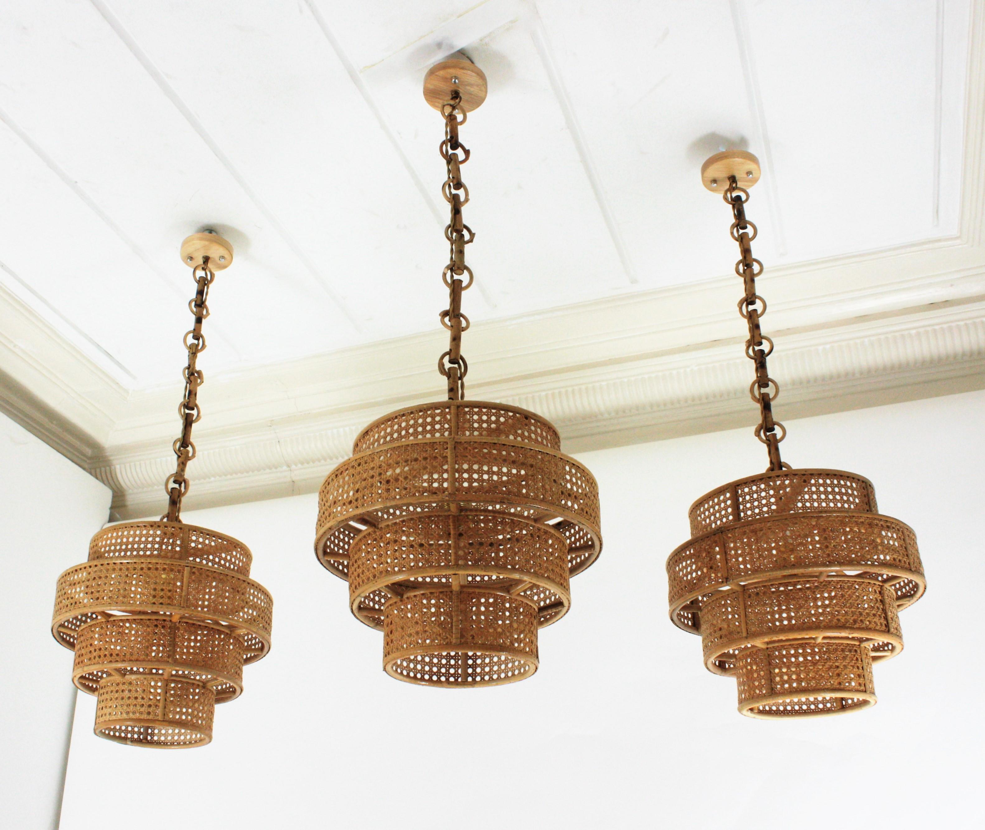 Bamboo Set of Three Rattan Wicker Weave Cylinder Pendant Lights / Lanterns For Sale