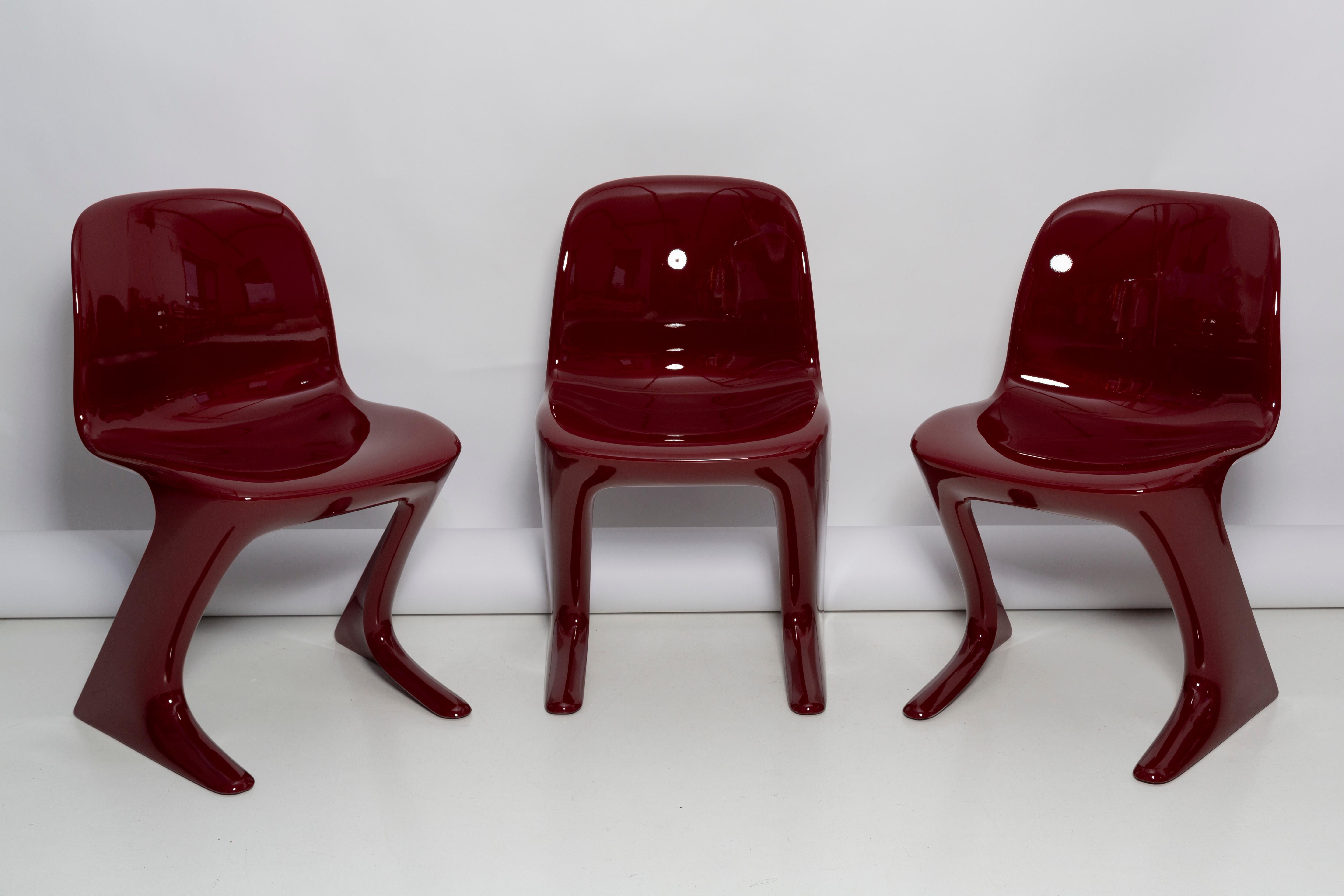 Lacquered Set of Three Red Wine Kangaroo Chairs Designed by Ernst Moeckl, Germany, 1968 For Sale