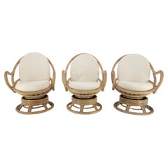Satz von drei Schaukelstühlen aus gedrehtem Rattan mit ovaler Rückenlehne c1970s MINT