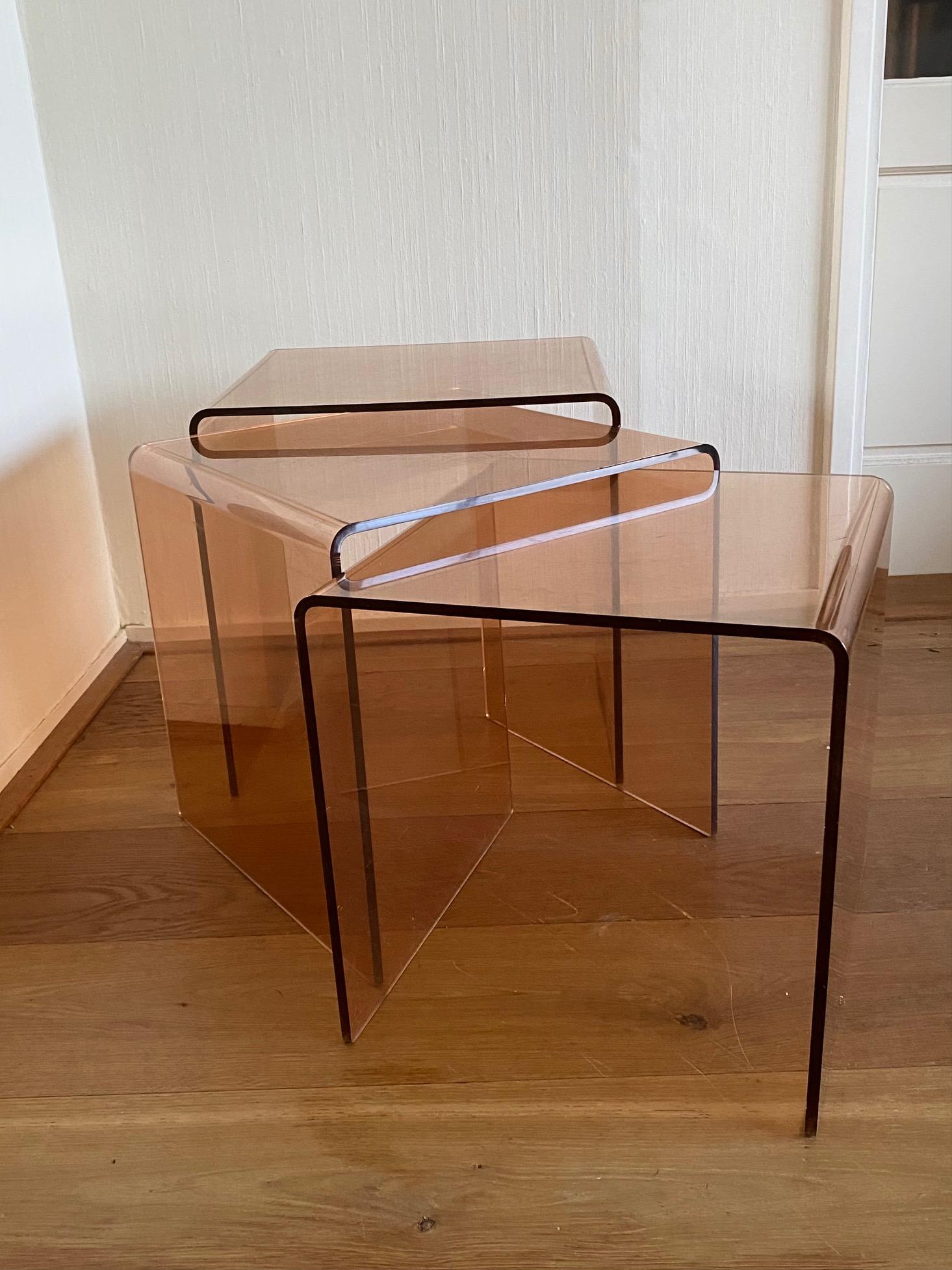 Lucite Set of Three Rosé Smoked  Nesting Tables, France, ca. 1970s For Sale