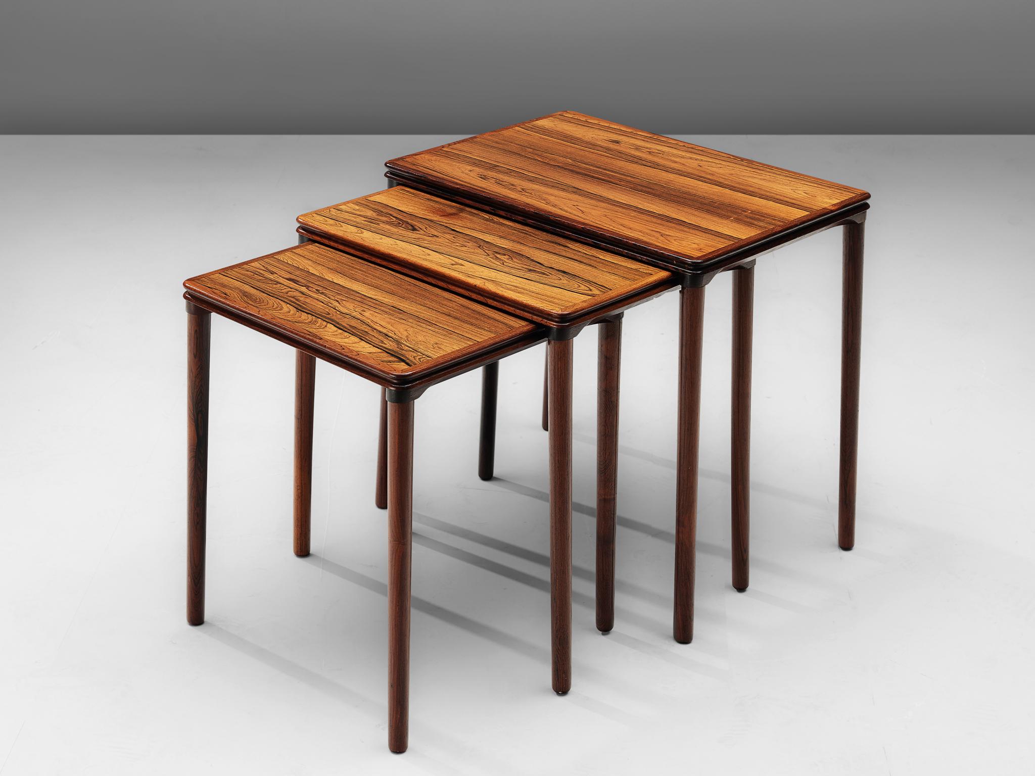 Scandinavian Modern Set of Three Rosewood Nesting Tables with Elegant Details