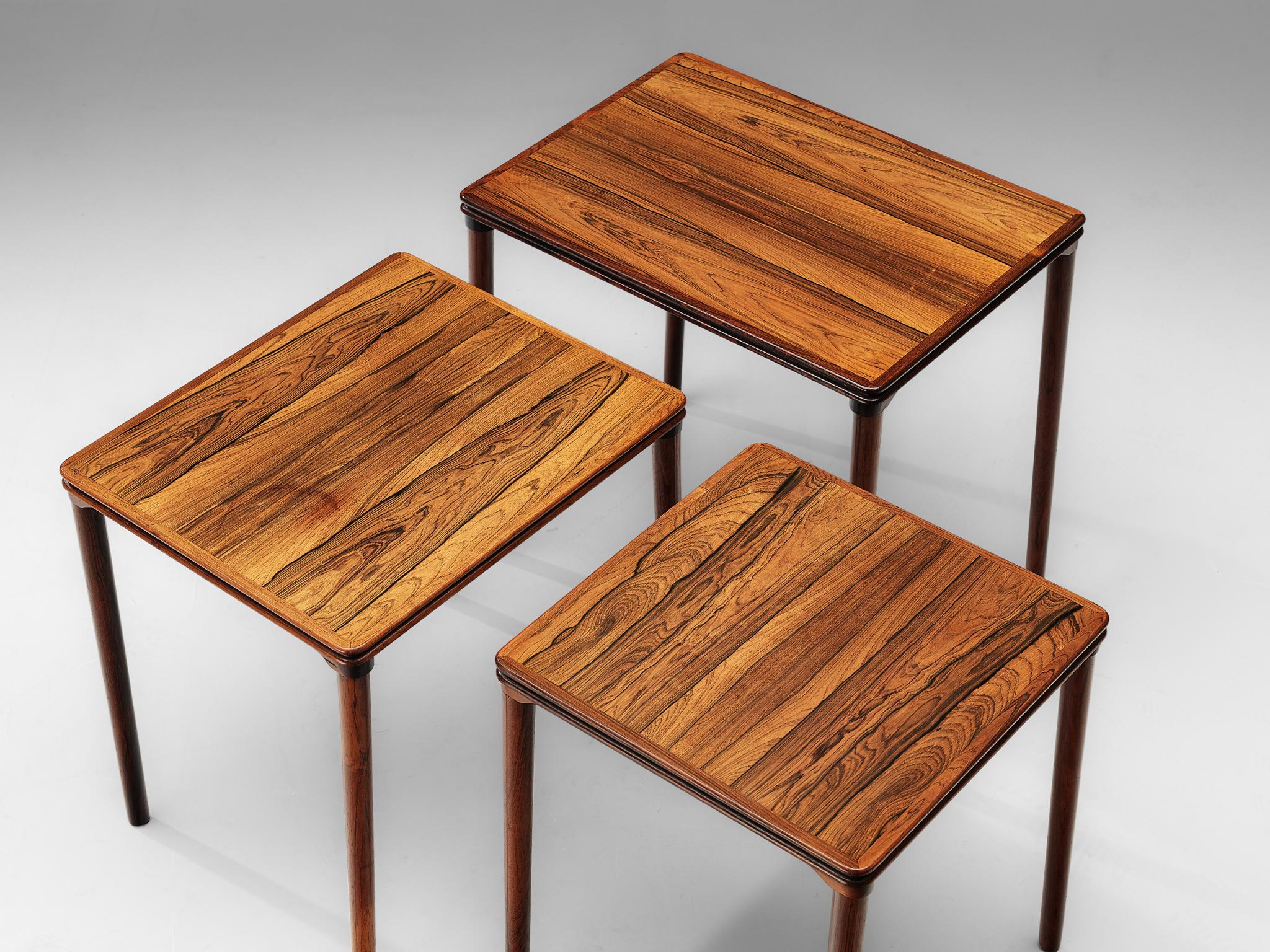 Scandinavian Set of Three Rosewood Nesting Tables with Elegant Details