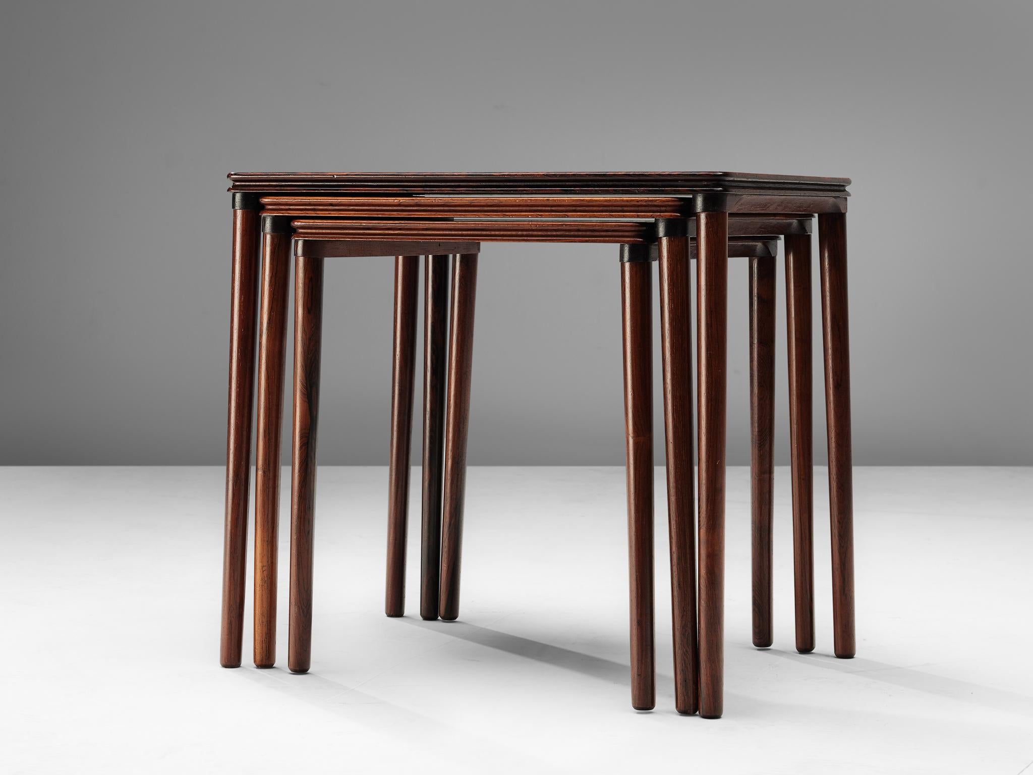 Mid-20th Century Set of Three Rosewood Nesting Tables with Elegant Details