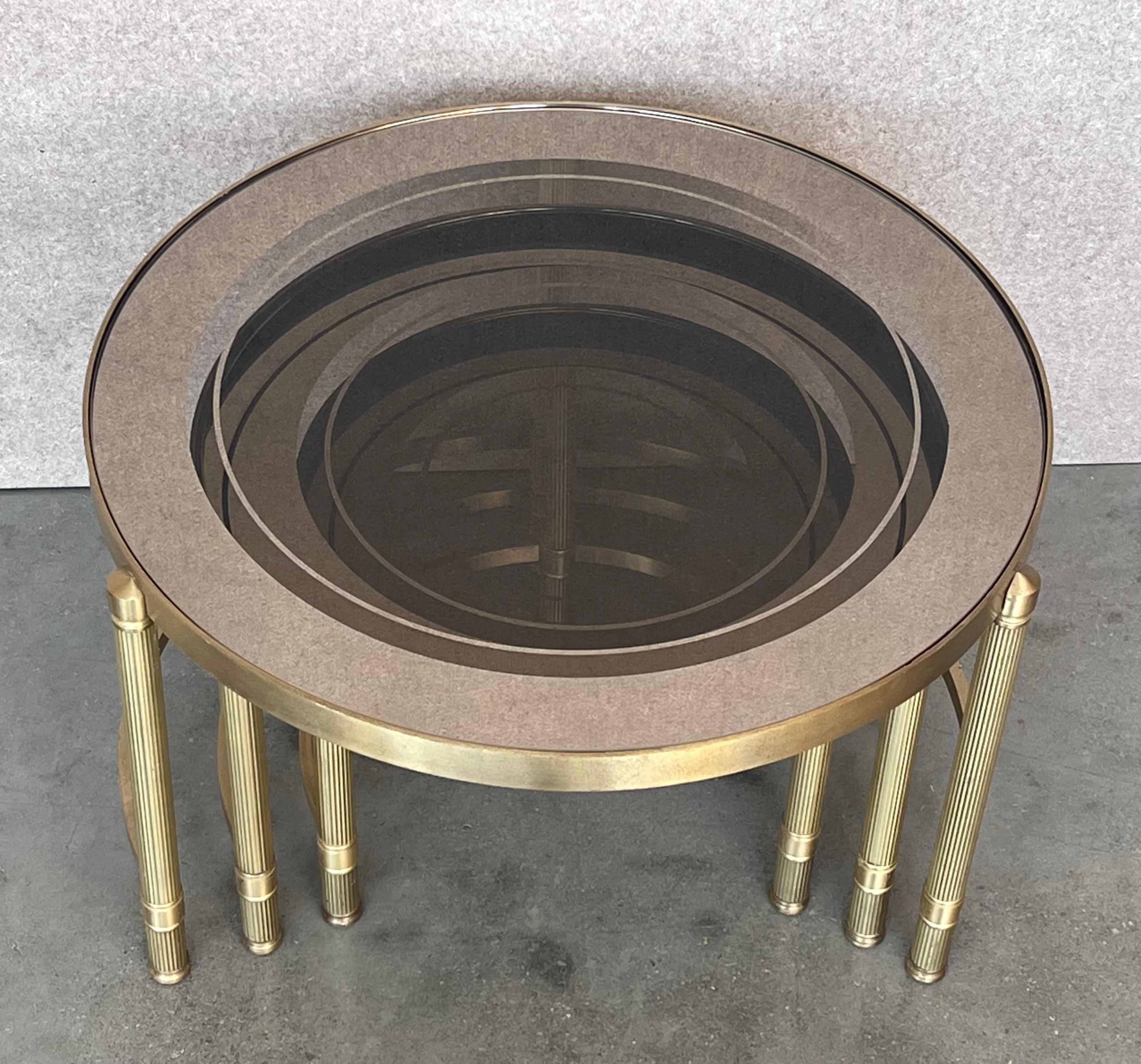 Set of Three Round Brass Nesting Tables with Smoked Pink Glass Tops For Sale 5
