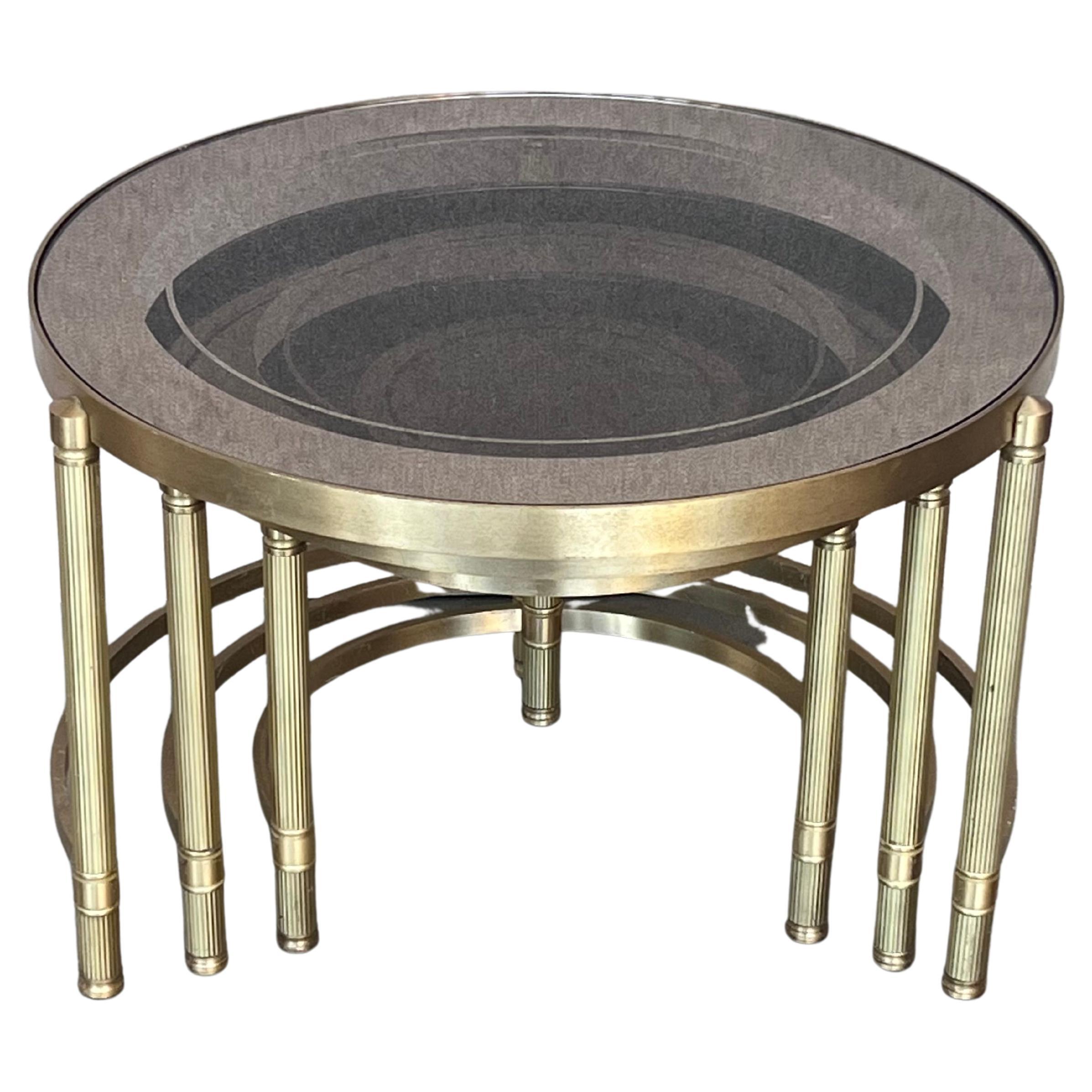 Set of Three Round Brass Nesting Tables with Smoked Pink Glass Tops For Sale