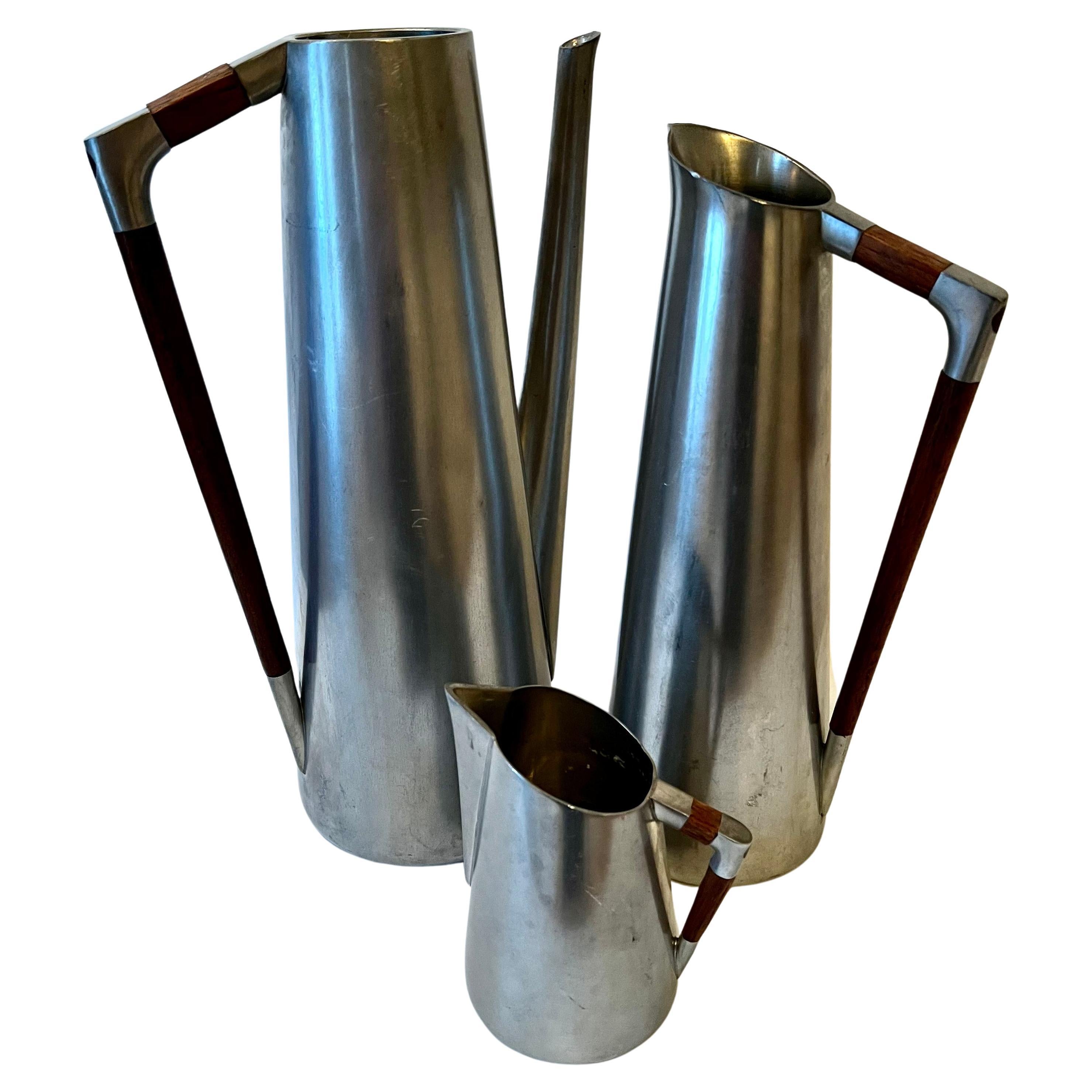 Set of Three Royal Holland Pewter Pitchers with Teak Handles For Sale