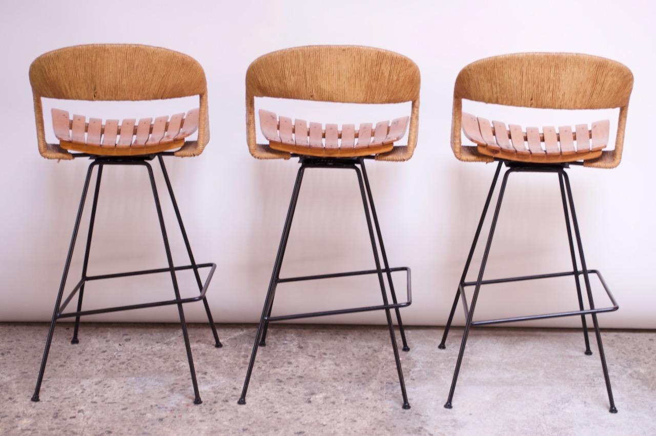 Set of Three Rush and Iron Swiveling Stools by Arthur Umanoff, Five Available In Good Condition In Brooklyn, NY