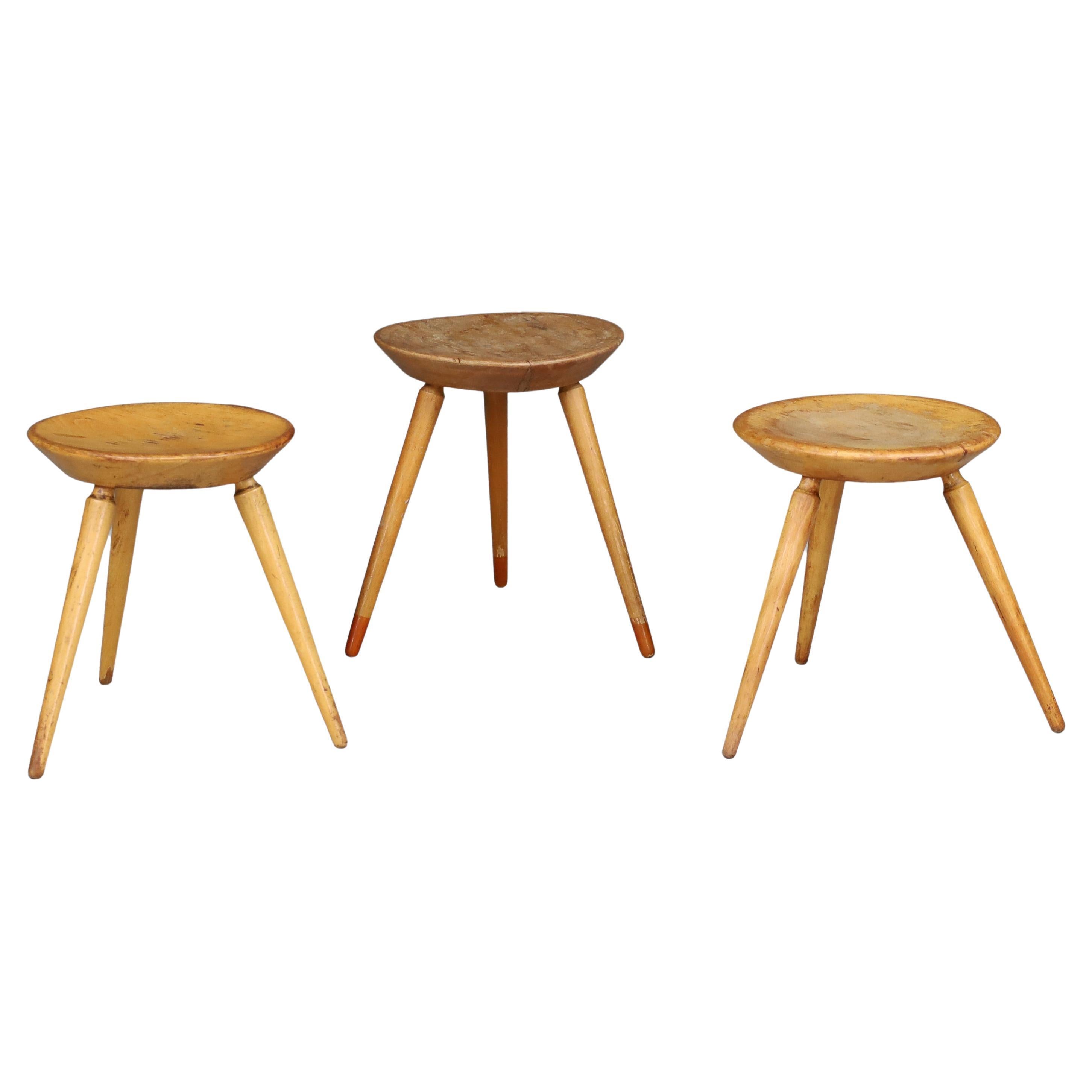 Set of Three Rustic Mid-Century Tripod Stools in Solid Wood, France, 1950s in vendita