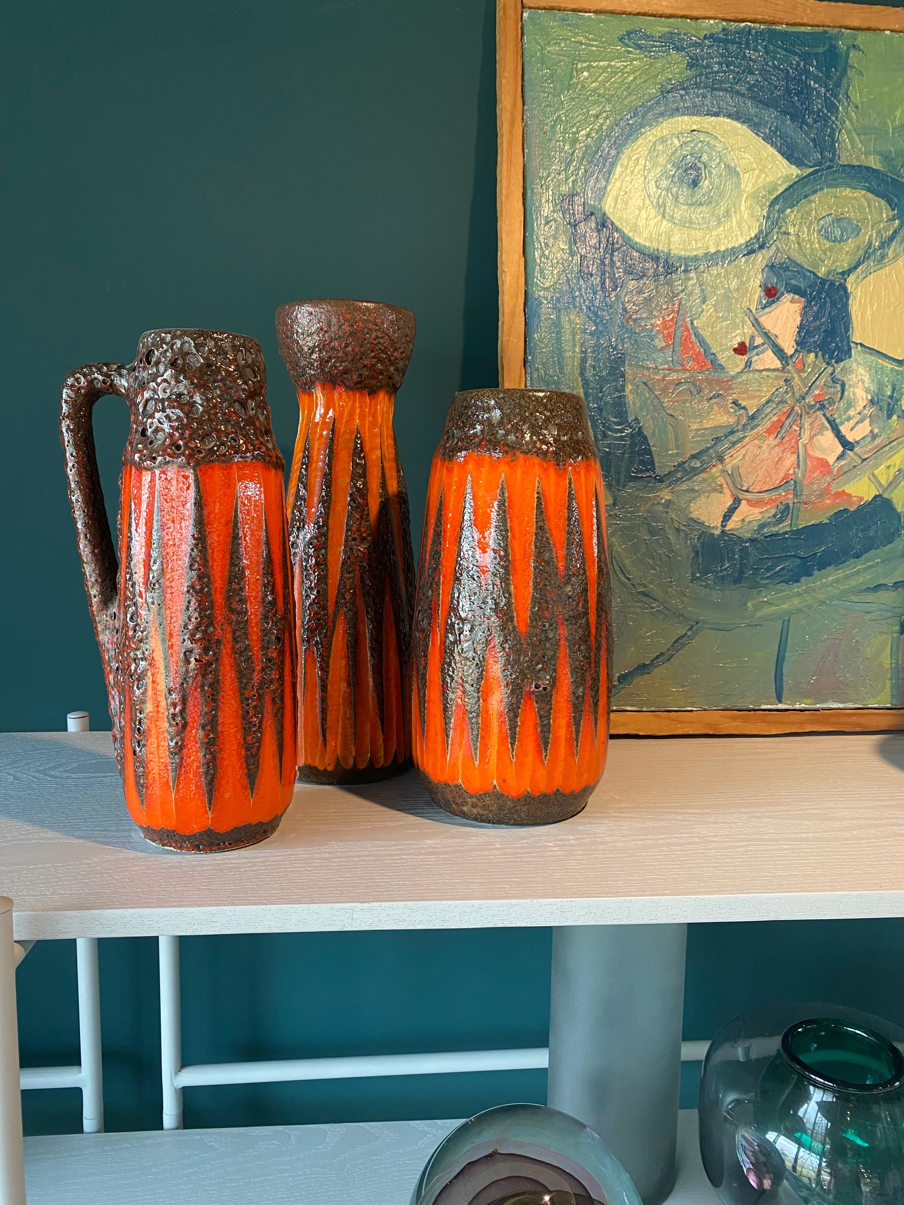 Set of three Fat Lava vases.
About Fat Lava Vases:
The bizarre pieces were mostly created without stamps and brands in the 1960s and 1970s and exclusively in West Germany. A serial code is all you sometimes find. Her name: Fat Lava Ceramics is not