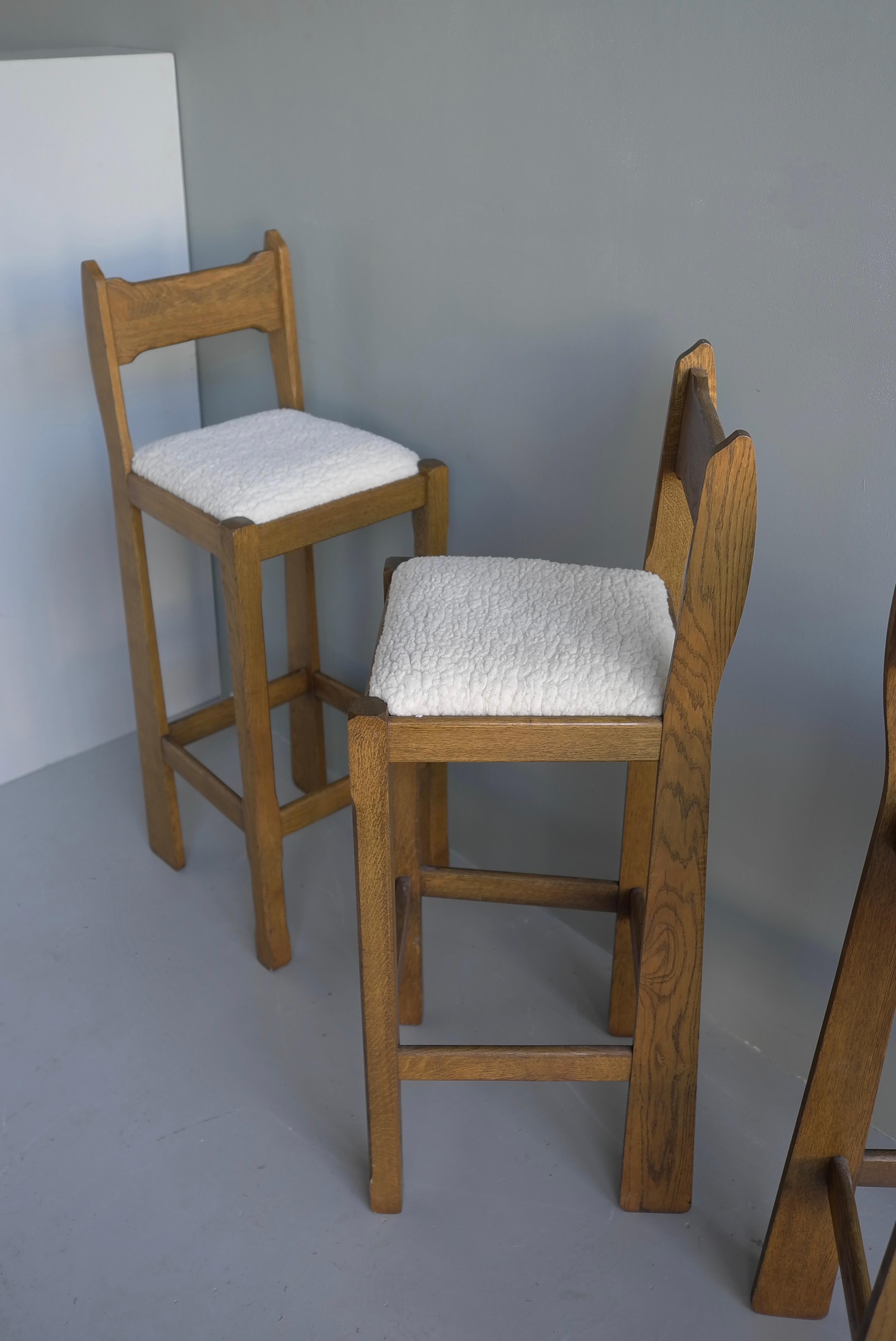 Set of Three Sculptural solid Oak Bar stools with Merino Wool seats france 1960s In Good Condition In Den Haag, NL