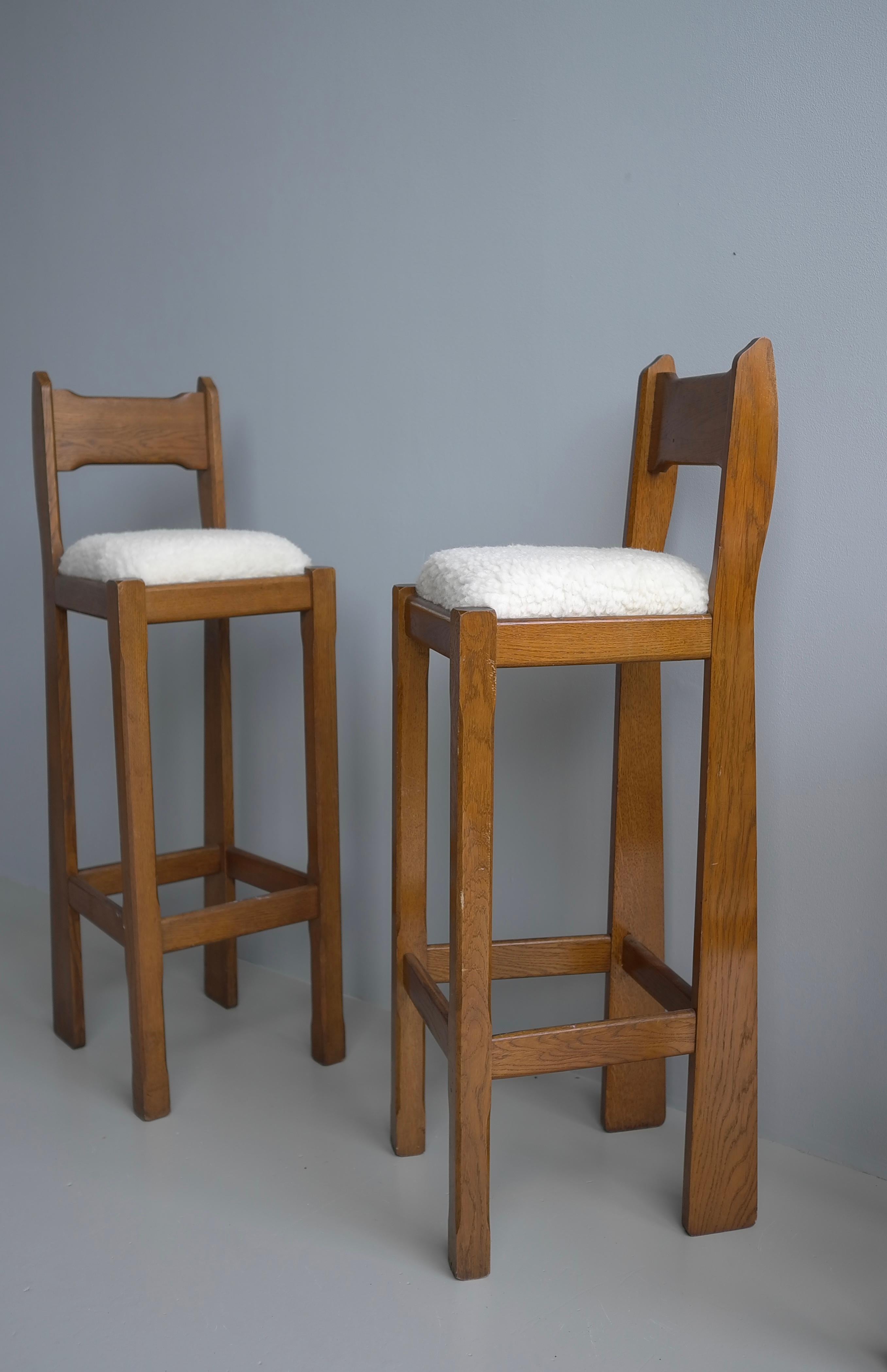 Mid-20th Century Set of Three Sculptural solid Oak Bar Stools with Merino Wool seats France 1960s For Sale
