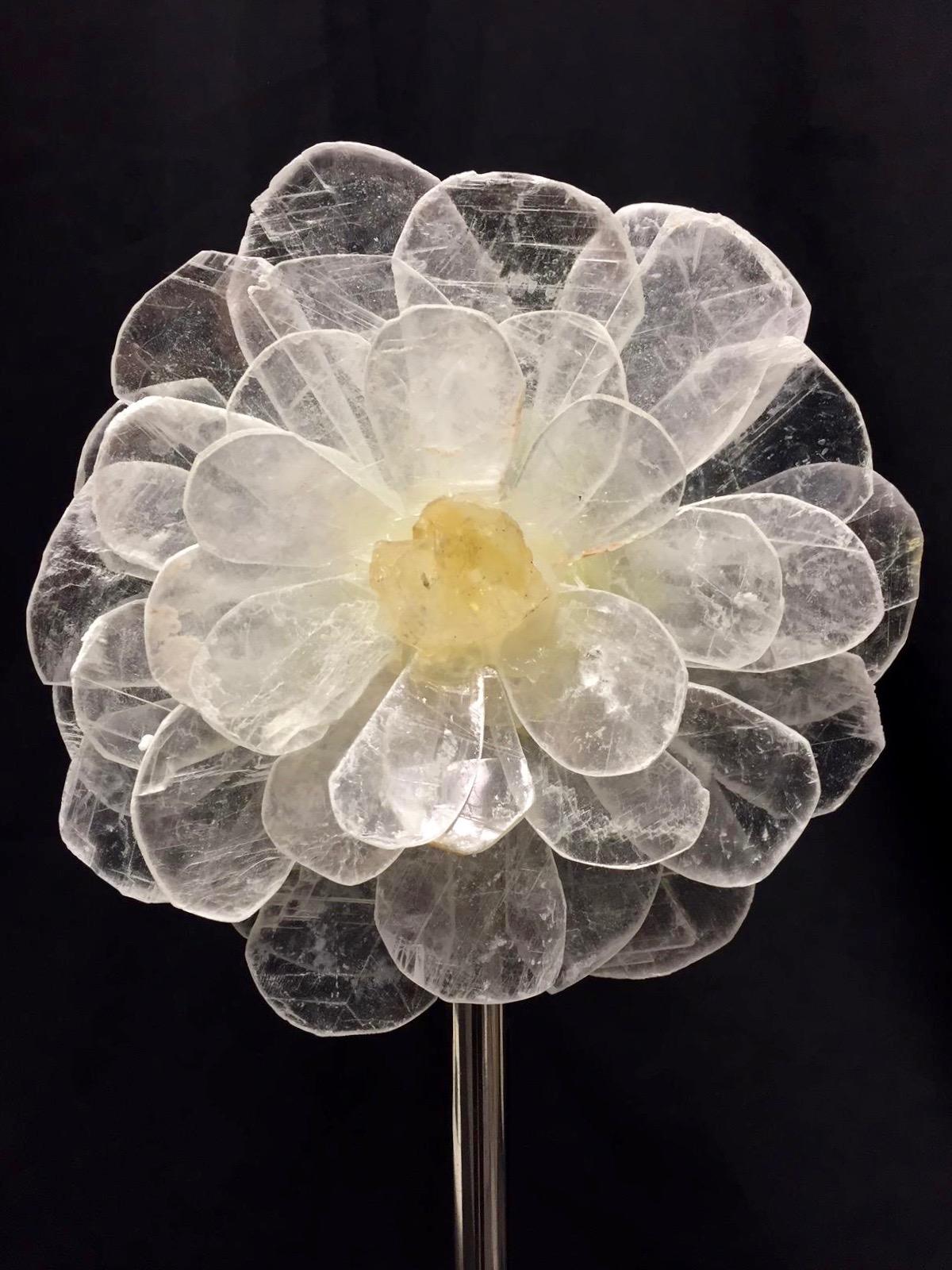 Set of three decorative flowers on marble stands. Each flower is made out of the gemstone Selenite. The center stones are Amethyst Quartz and Citrine Quartz. Overall heights are 21