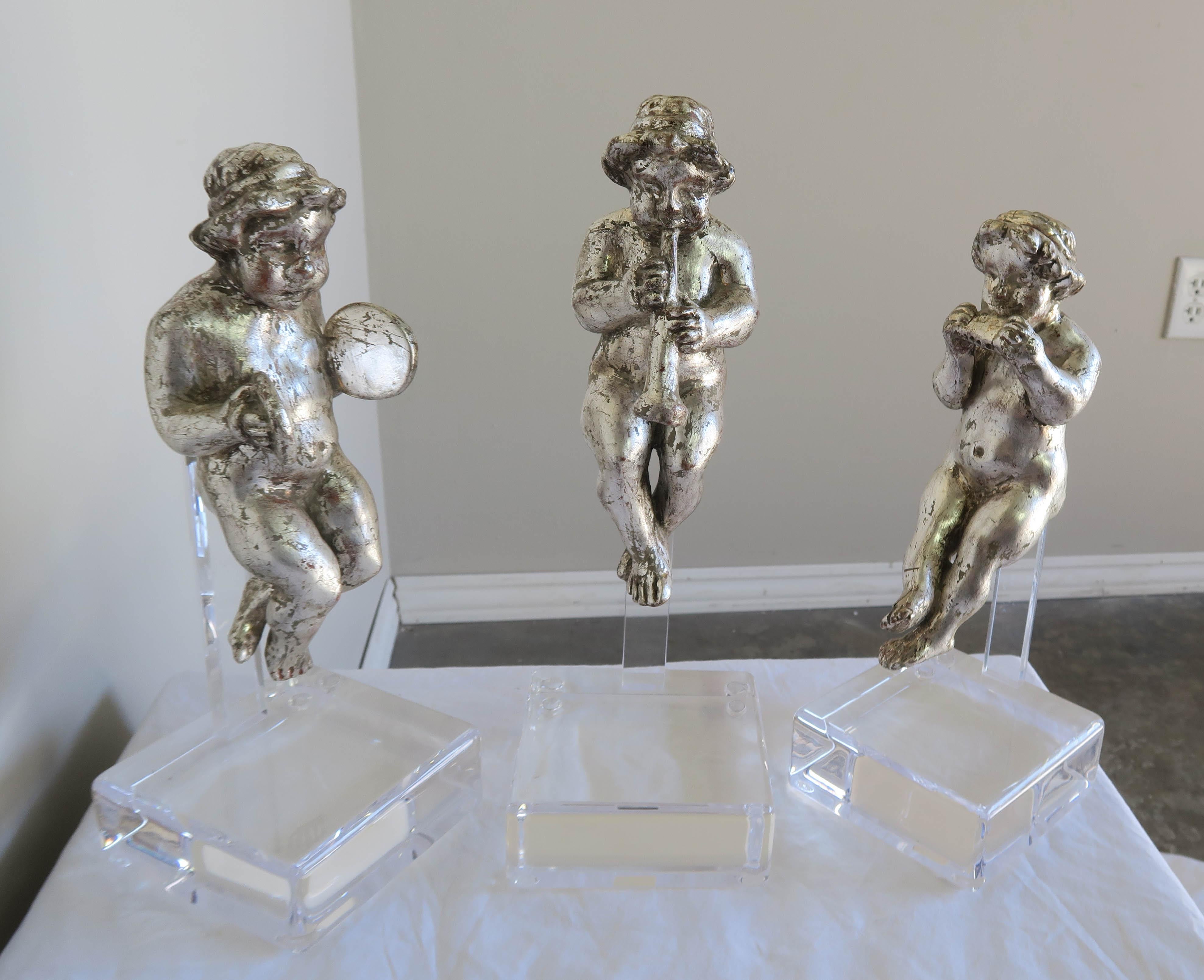 Rococo Set of Three Silver Gilt Musical Cherubs on Lucite Bases For Sale