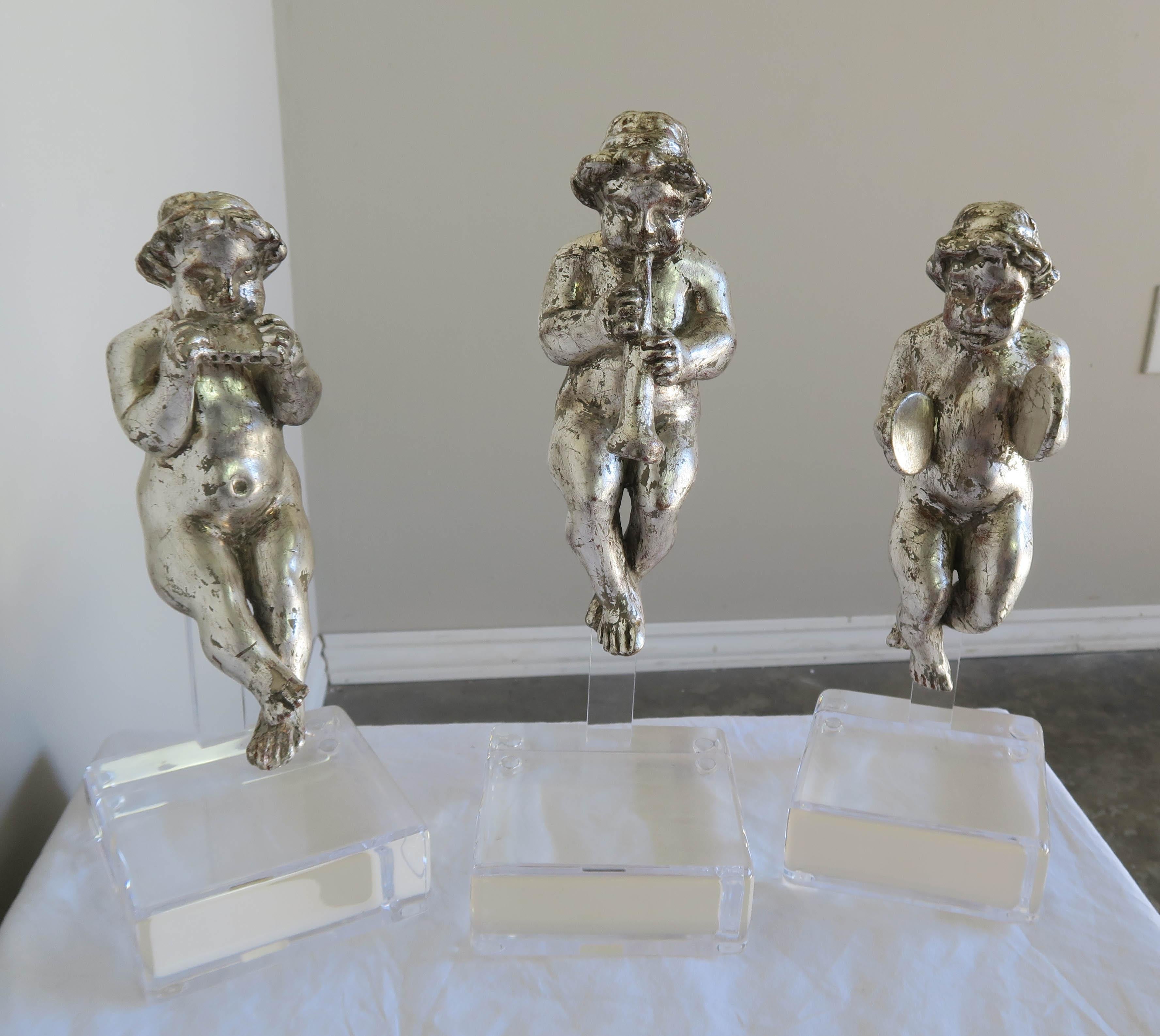 Italian Set of Three Silver Gilt Musical Cherubs on Lucite Bases For Sale
