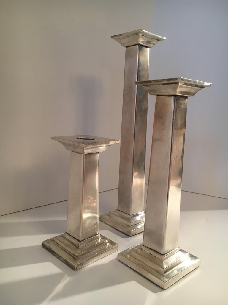 Set of three silver plate column candlesticks - a handsome trio ready for your next dinner party or soiree!

3 sizes all 3