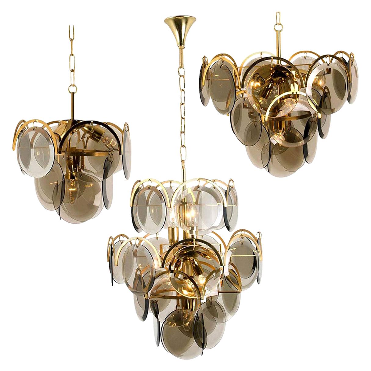 Set of Three Smoked Glass and Brass Chandeliers in the Style of Vistosi, Italy For Sale