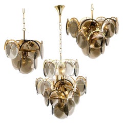 Set of Three Smoked Glass and Brass Chandeliers in the Style of Vistosi, Italy