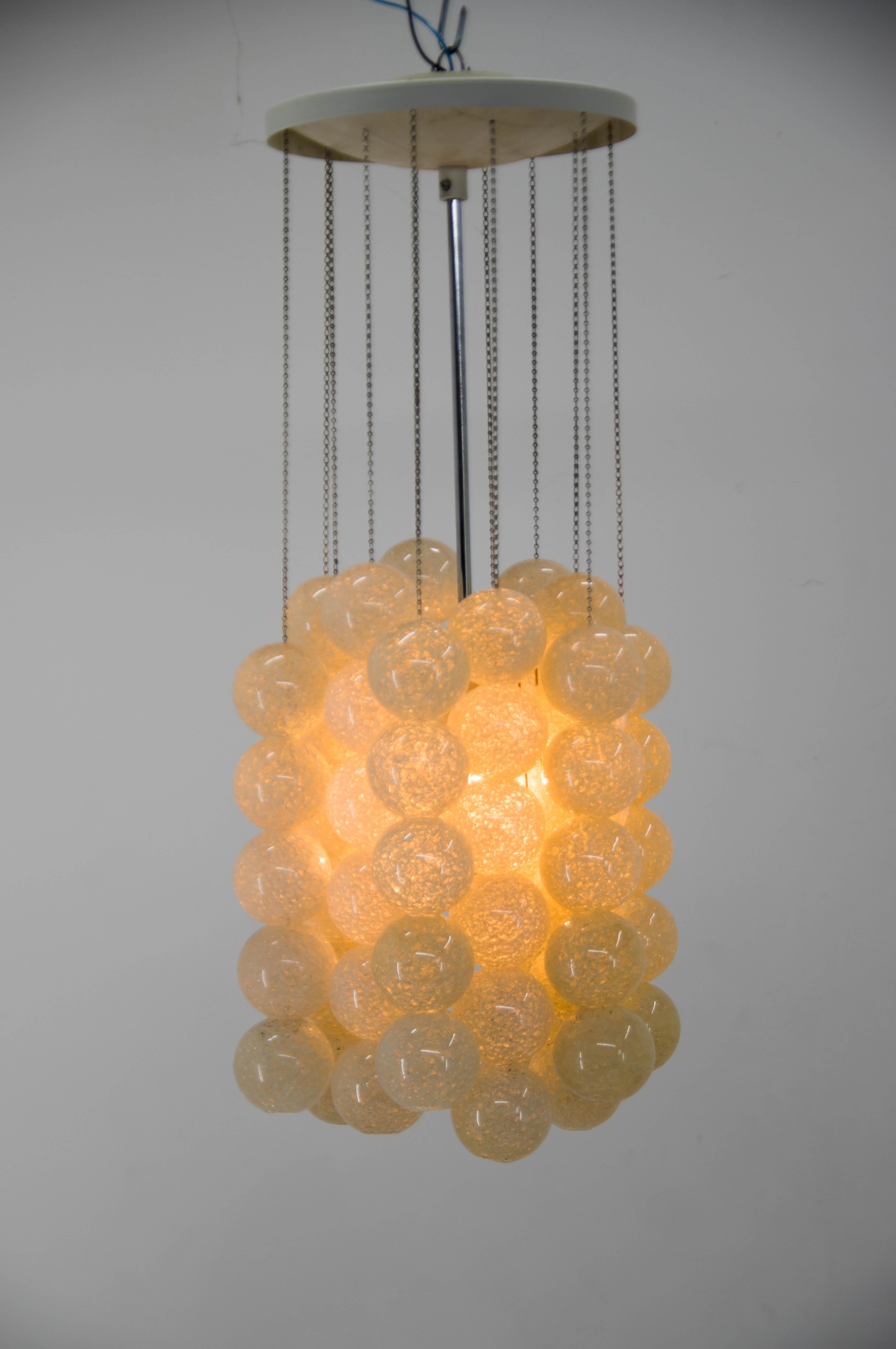 Extraordinary chandeliers by Napako, Czechoslovakia, 1970s, very good original condition.
White metal base and resin ball shade ivory color.
- 1 x 100W, E27 (E25, E26) bulb
- Marked with metal label.
US wiring compatible.