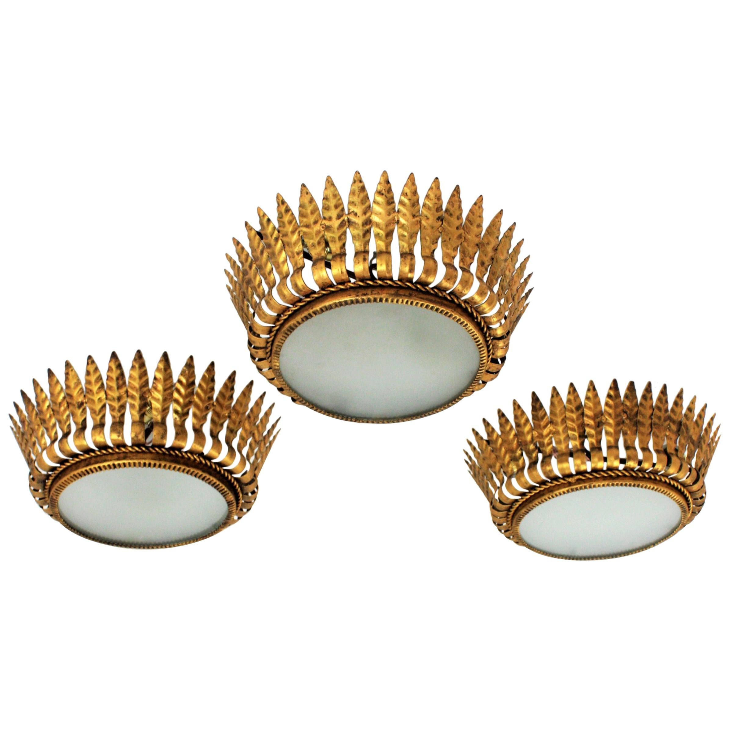 Set of Three Spanish Gilt Metal Crown Light Fixtures with Leaves & Frosted Glass