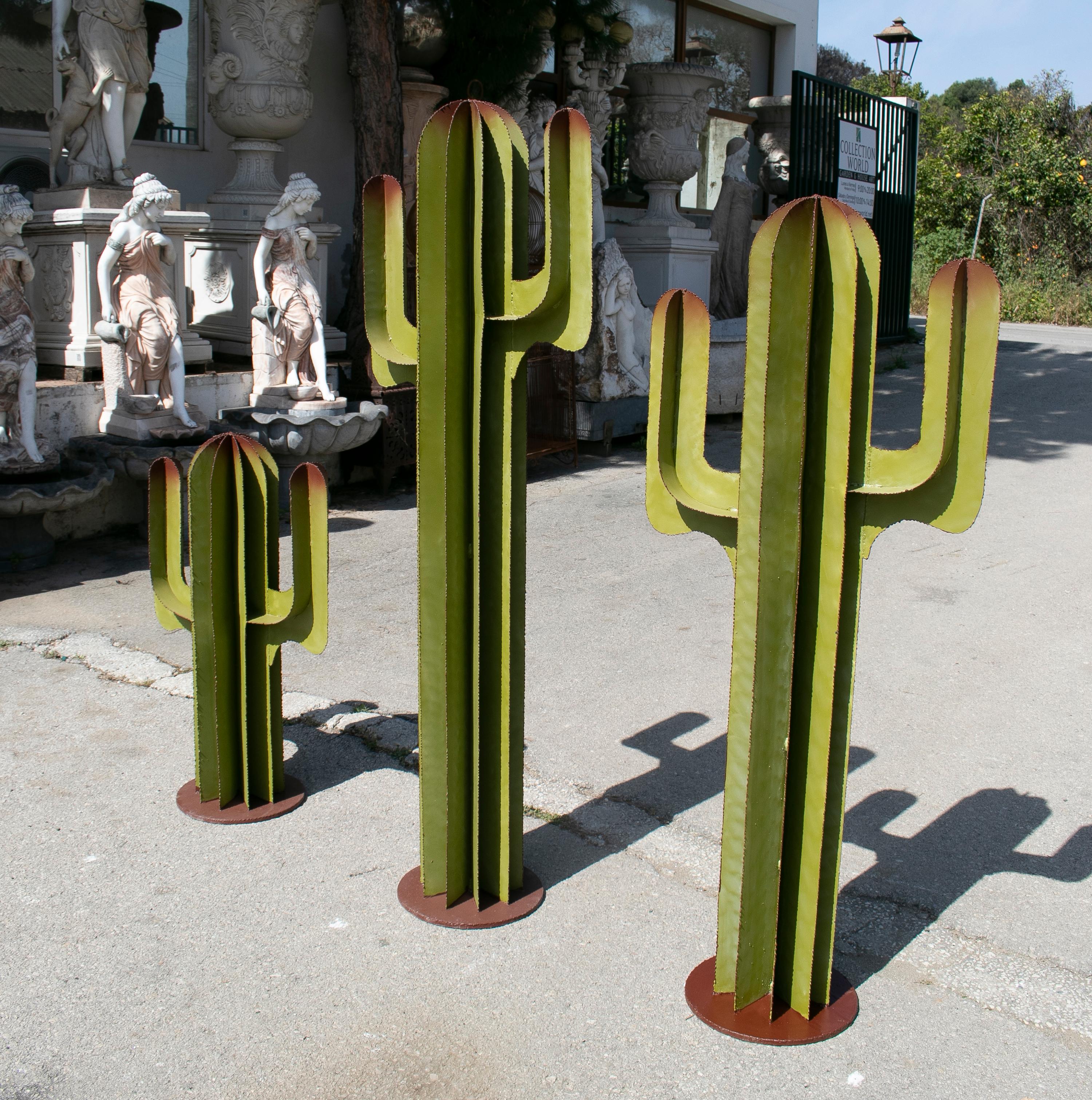 Set of three Spanish iron cactus garden sculptures.