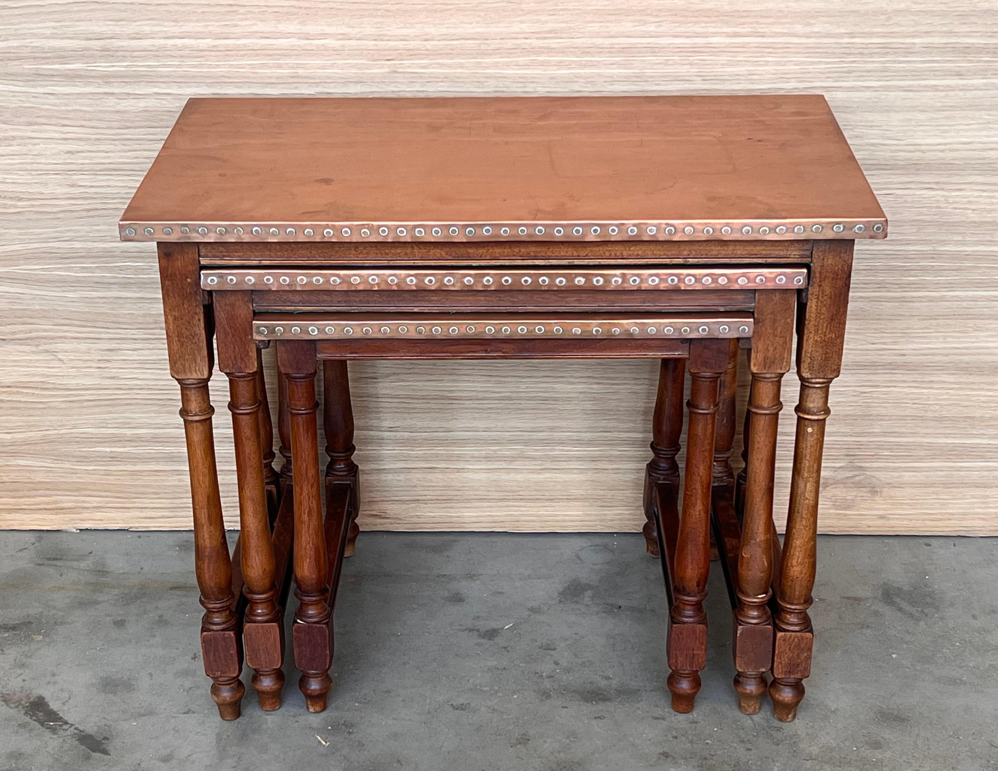 Set of Three Spanish Walnut Nesting tables with copper top In Good Condition For Sale In Miami, FL