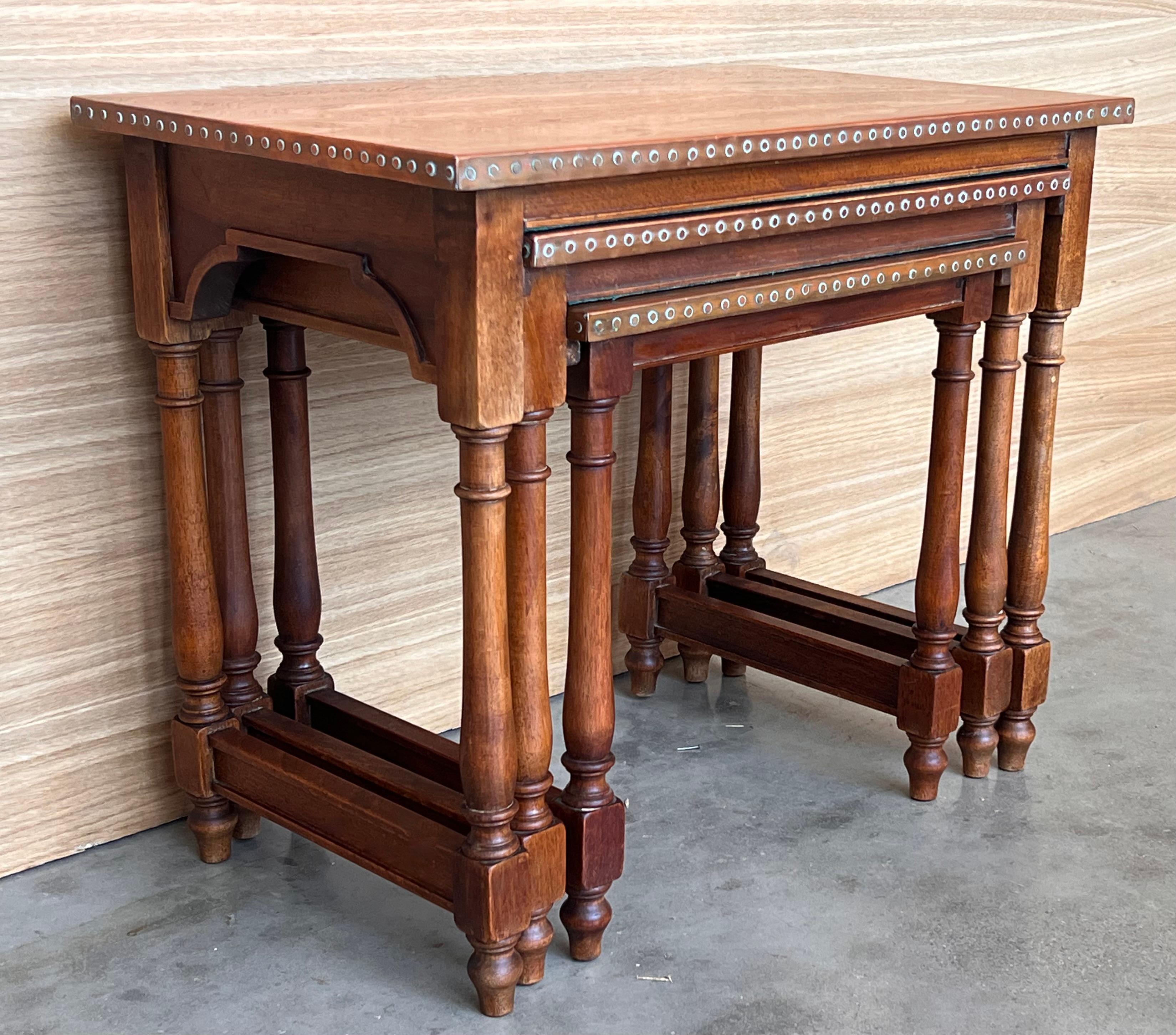 20th Century Set of Three Spanish Walnut Nesting tables with copper top For Sale