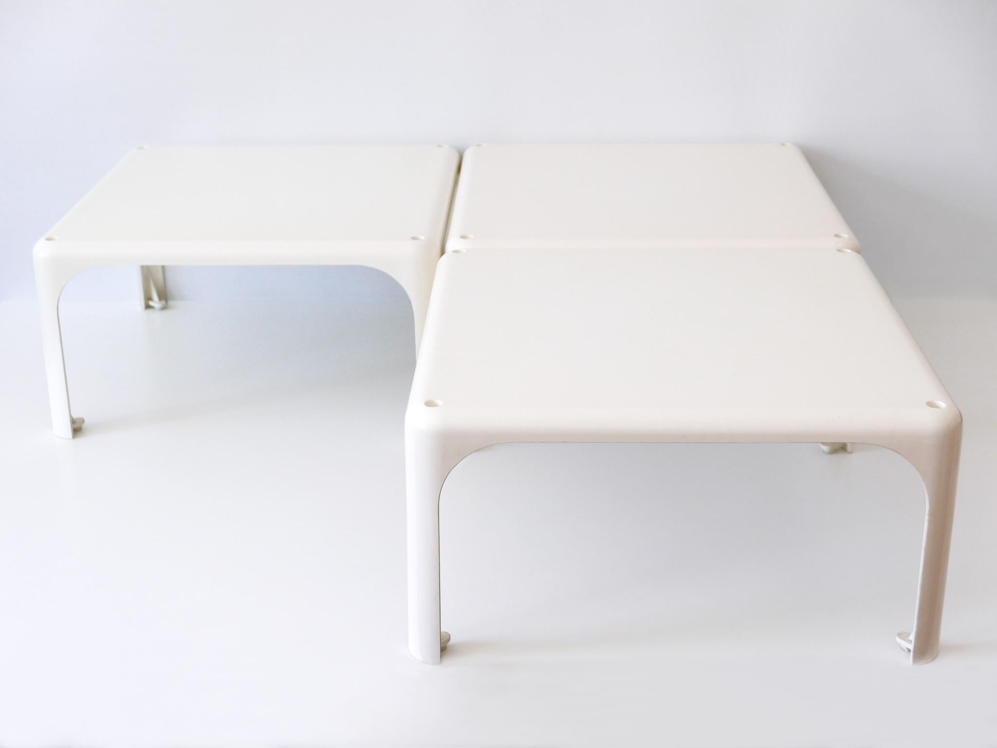 Set of three Mid-Century Modern low side tables 'Demetrio 45'. Designed by Vico Magistretti for Artemide, Italy, 1960s. Each item marked underside.

Executed in glossy molded white plastic.

Condition: 
Good original vintage condition. Wear