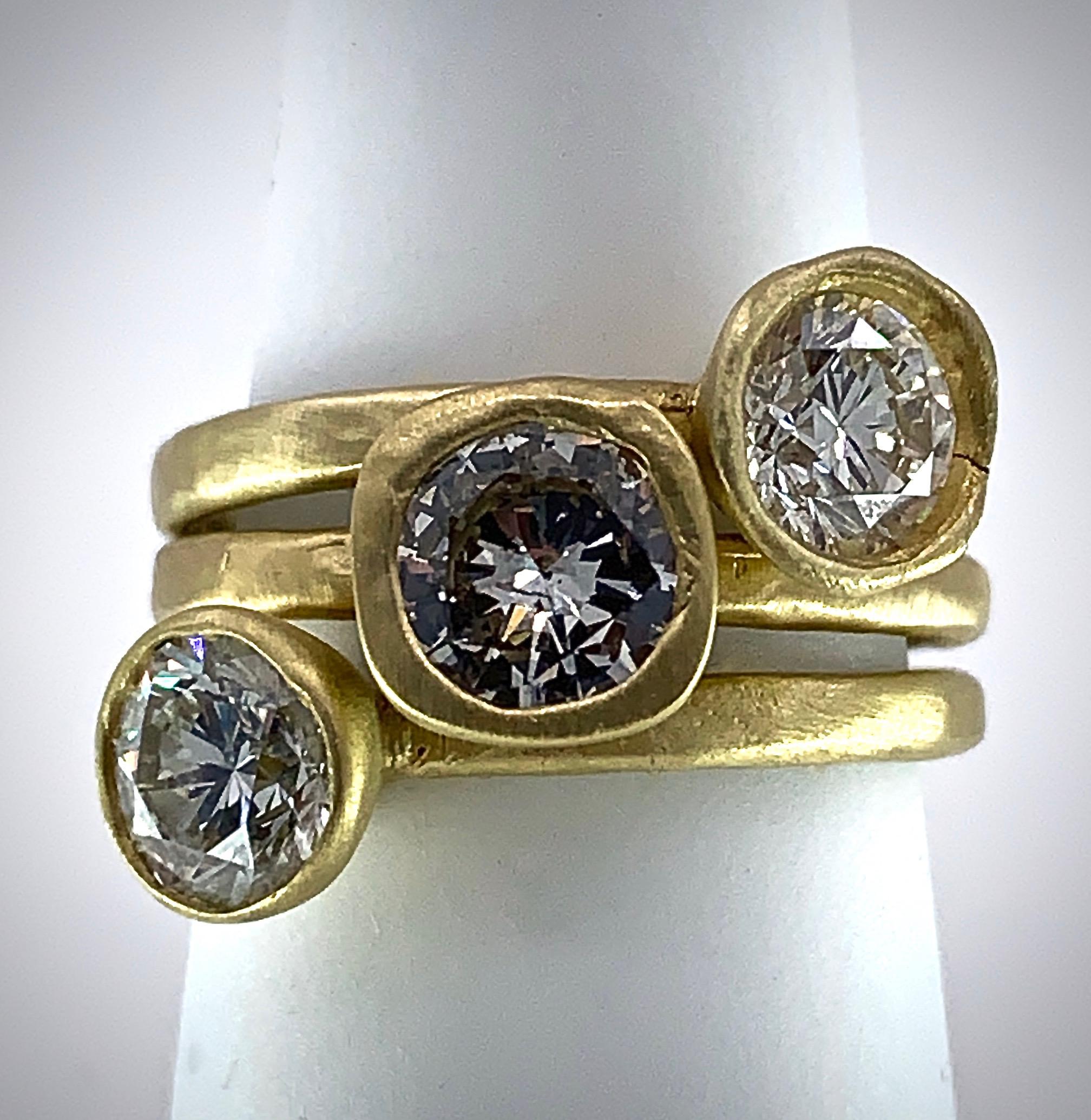 Contemporary Set of Three Stacking Diamond Solitaires in 18 Karat Yellow Gold