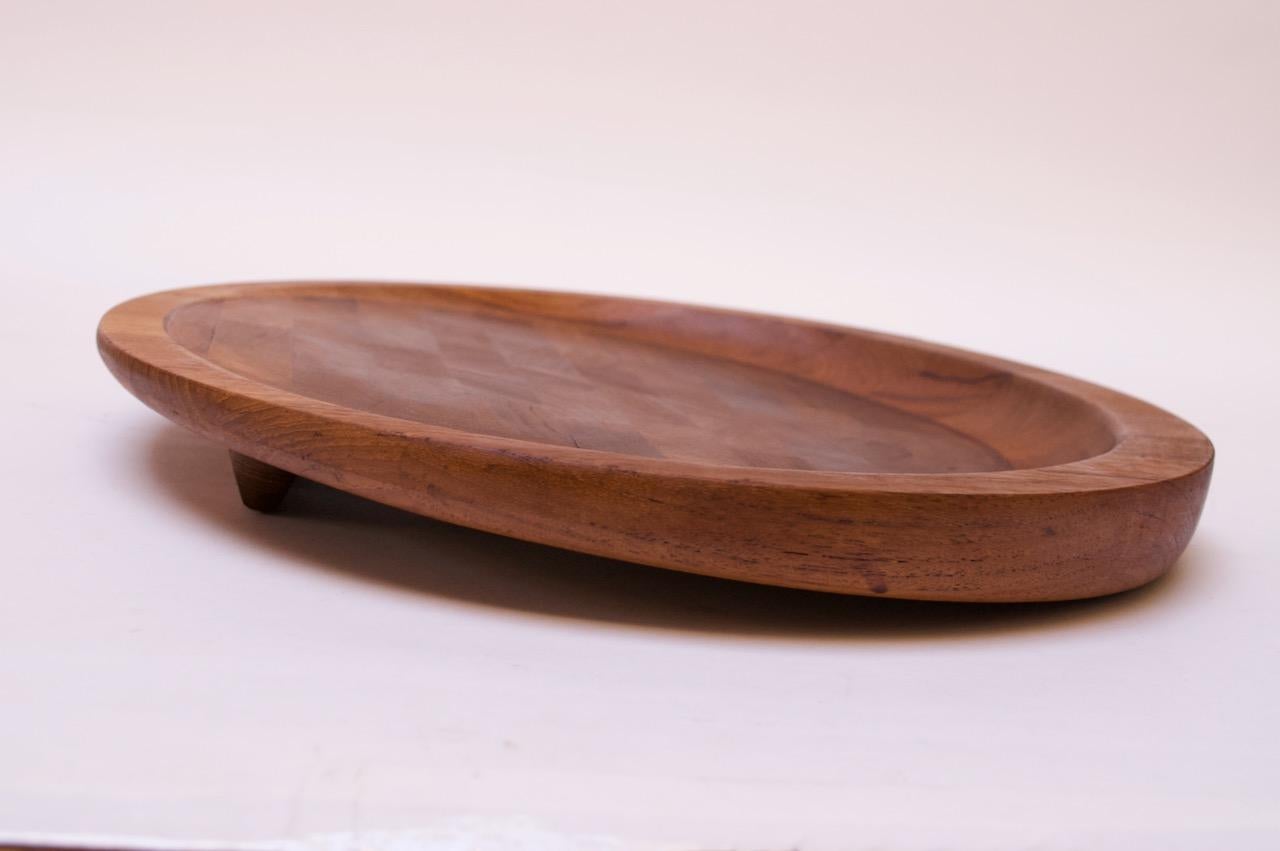 Juego de tres tablas de cortar / bandejas de madera de teca por Jens Quistgaard para Dansk mediados del siglo XX en venta
