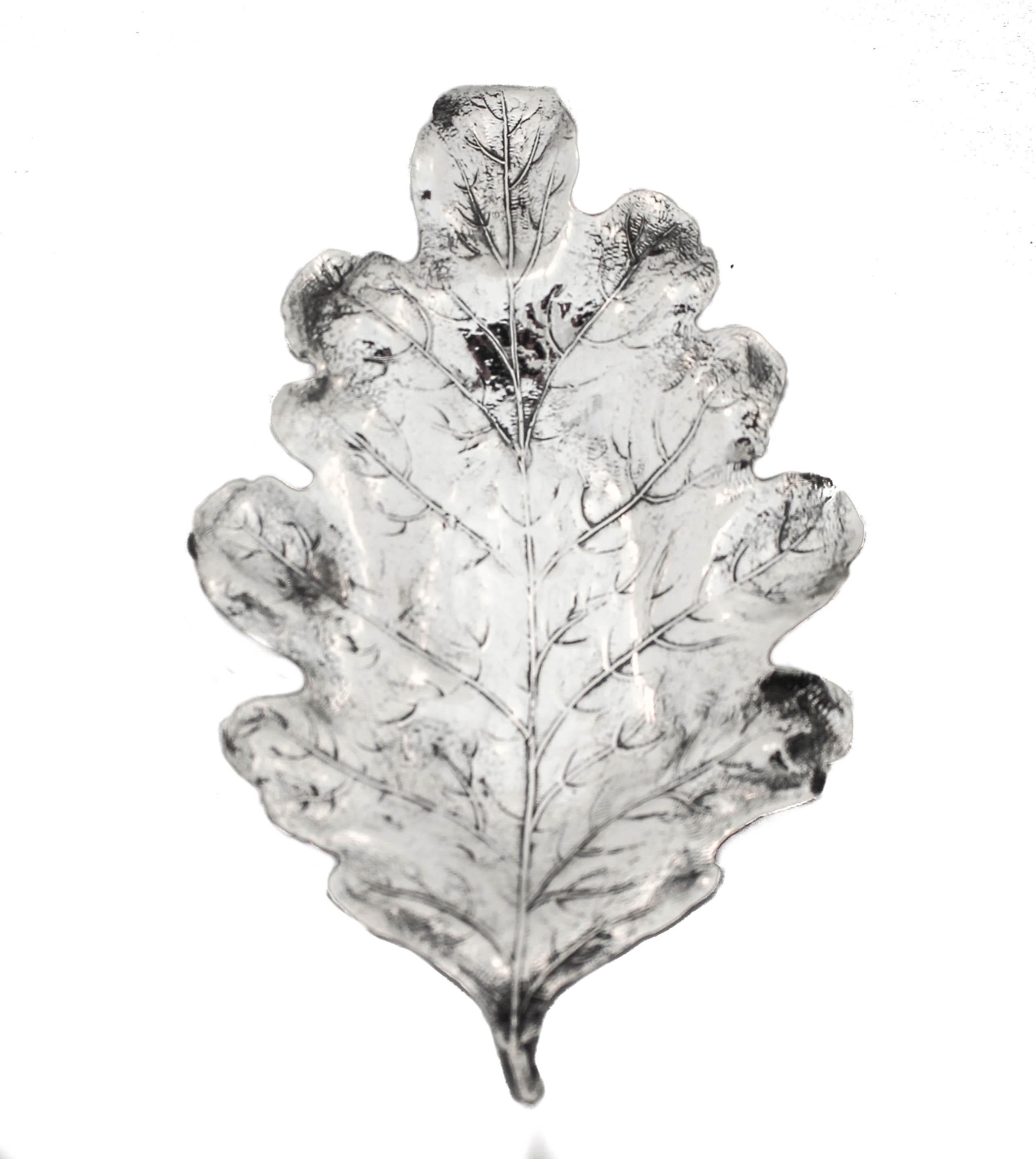 Being offered is a set of three sterling silver leaves by R. Blackington & Company.  Each one is different than the other: Elm, Holly and Maple leaves.  They can be used as decorative pieces (think fall or Thanksgiving) or to hold sweets or even