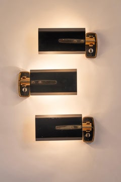 Set of three Stilnovo wall lights. Italy c1950