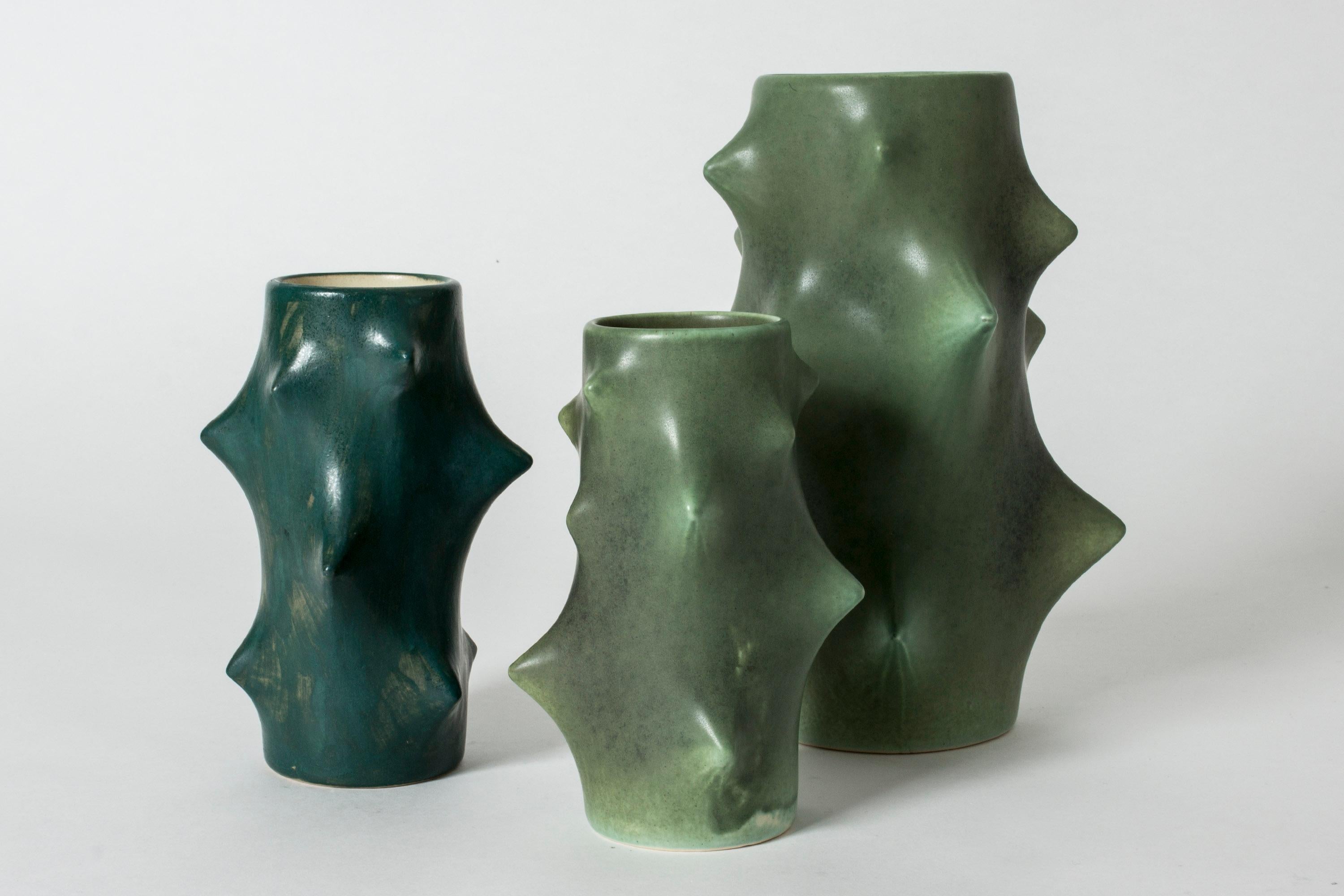 Set of three stoneware vases by Knud Basse, in shapes where points on the bodies are pressing outwards. Cactus-like forms, very decorative.

Measures: Height 26 / 18.5 / 17.5 cm
Diameter 18 / 12 cm.