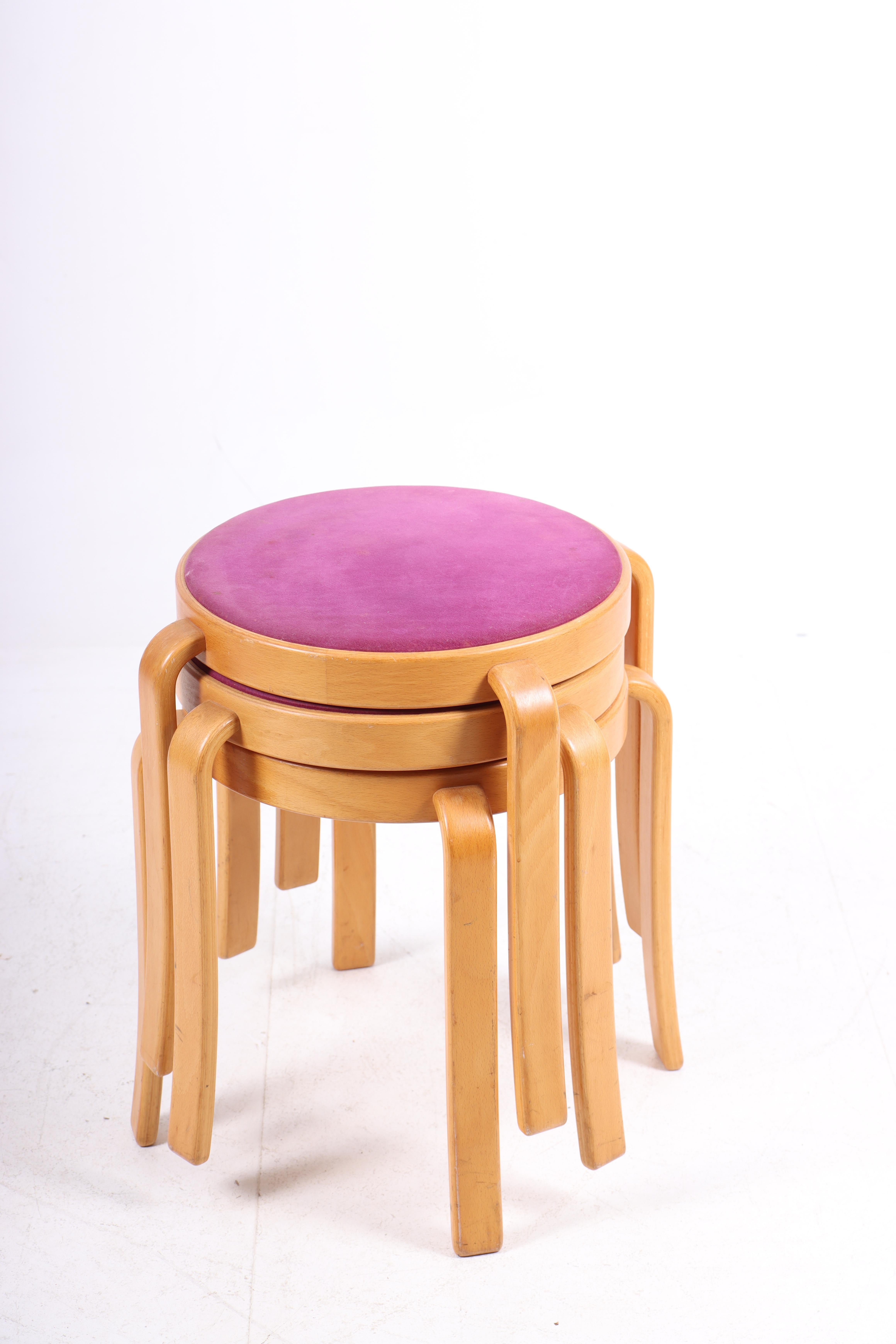 Set of three stools in beech frame and wool. Designed by Danish architects Johnny Sørensen and Rud Thygesen.