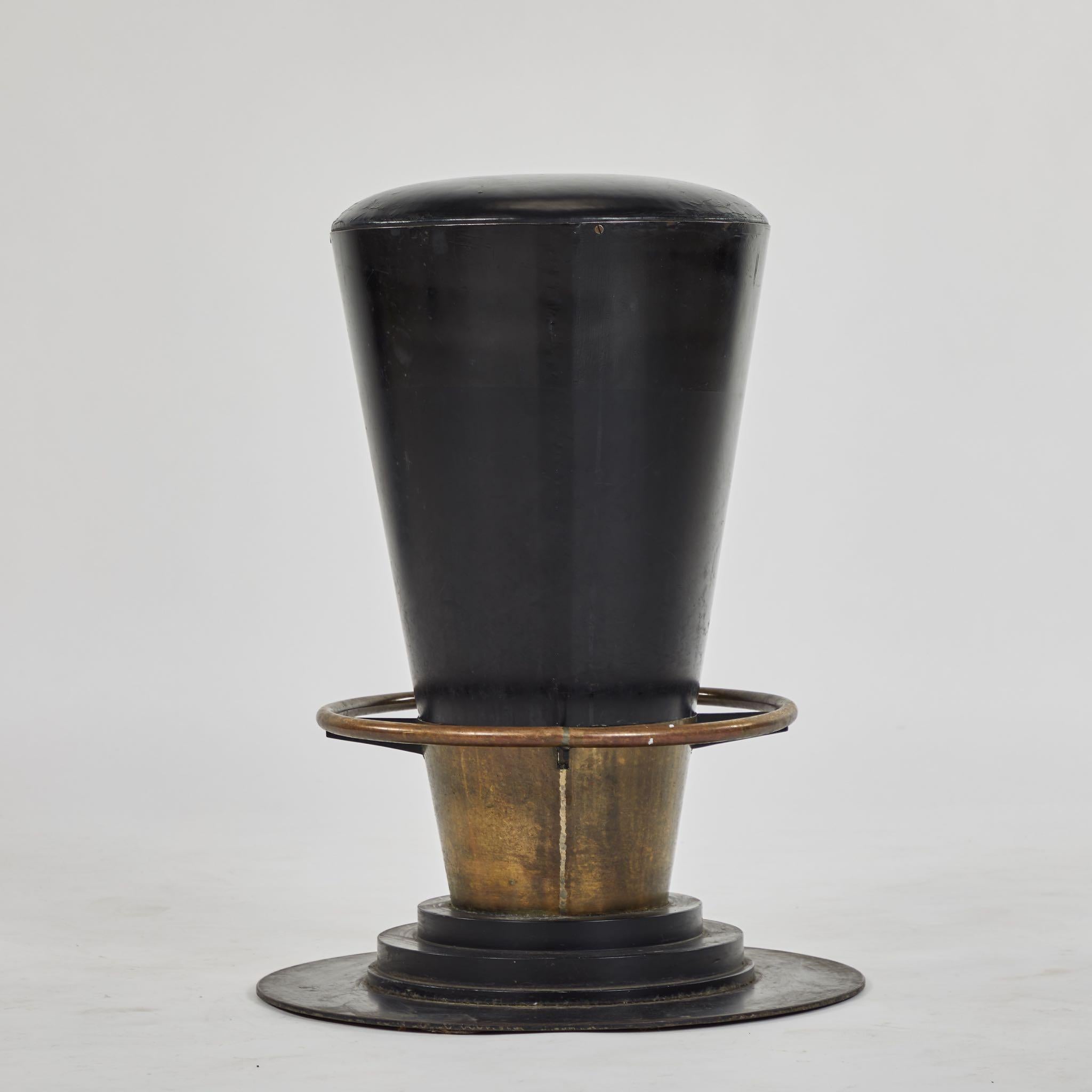 Set of three stools in leather with brass trim, seat width of 17 inches. Originating in England, circa 1900.