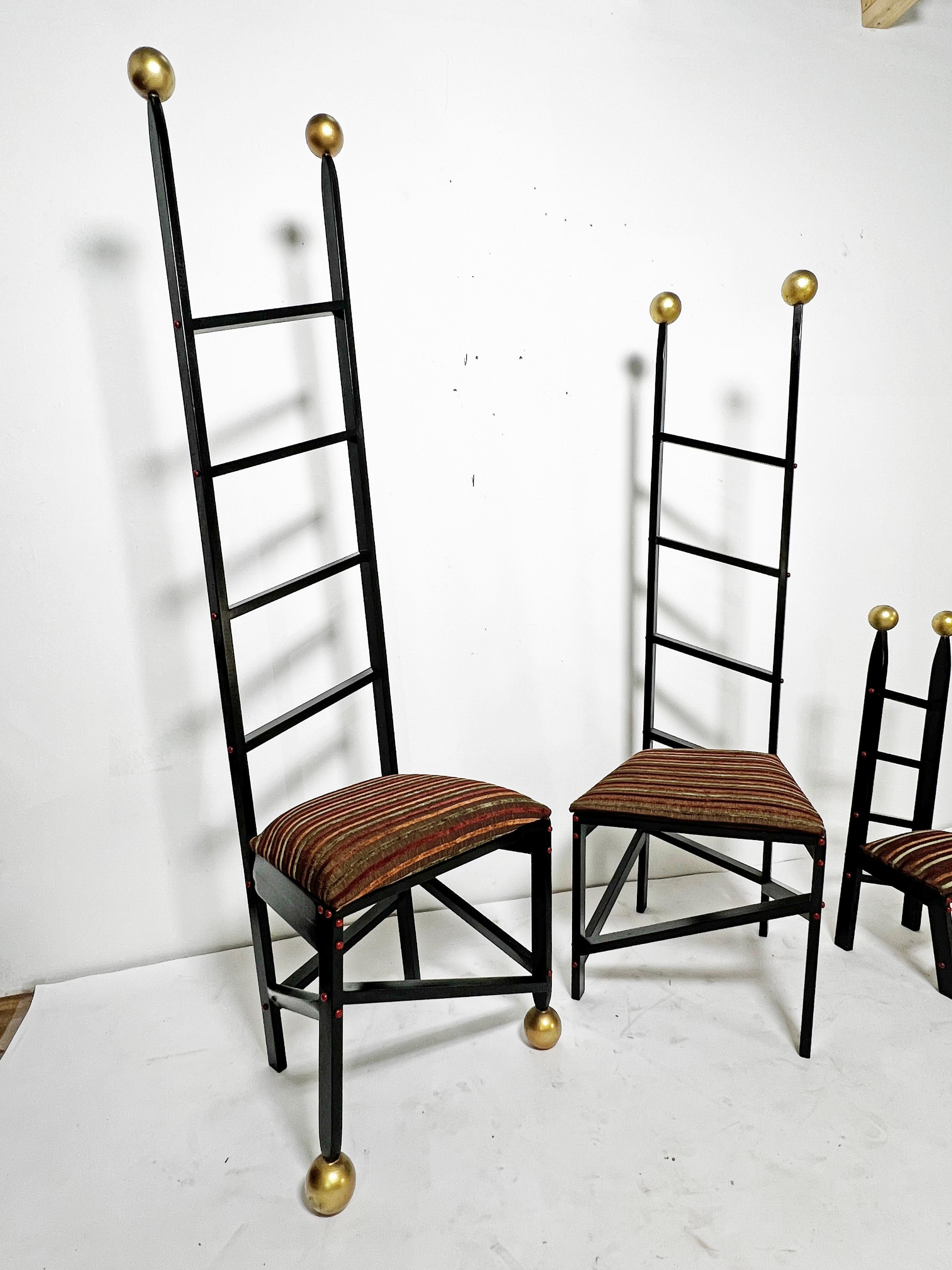 A family of three abstract ladderback chairs from the art furniture movement of the late 20th century. These sculptural yet sturdy and functional seats are signed King and dated 1993.  Most likely by the Idaho artist Donald King who works in a