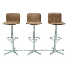 Set of Three Swivel Bar Stools in Brown Leather and Chrome 1970s