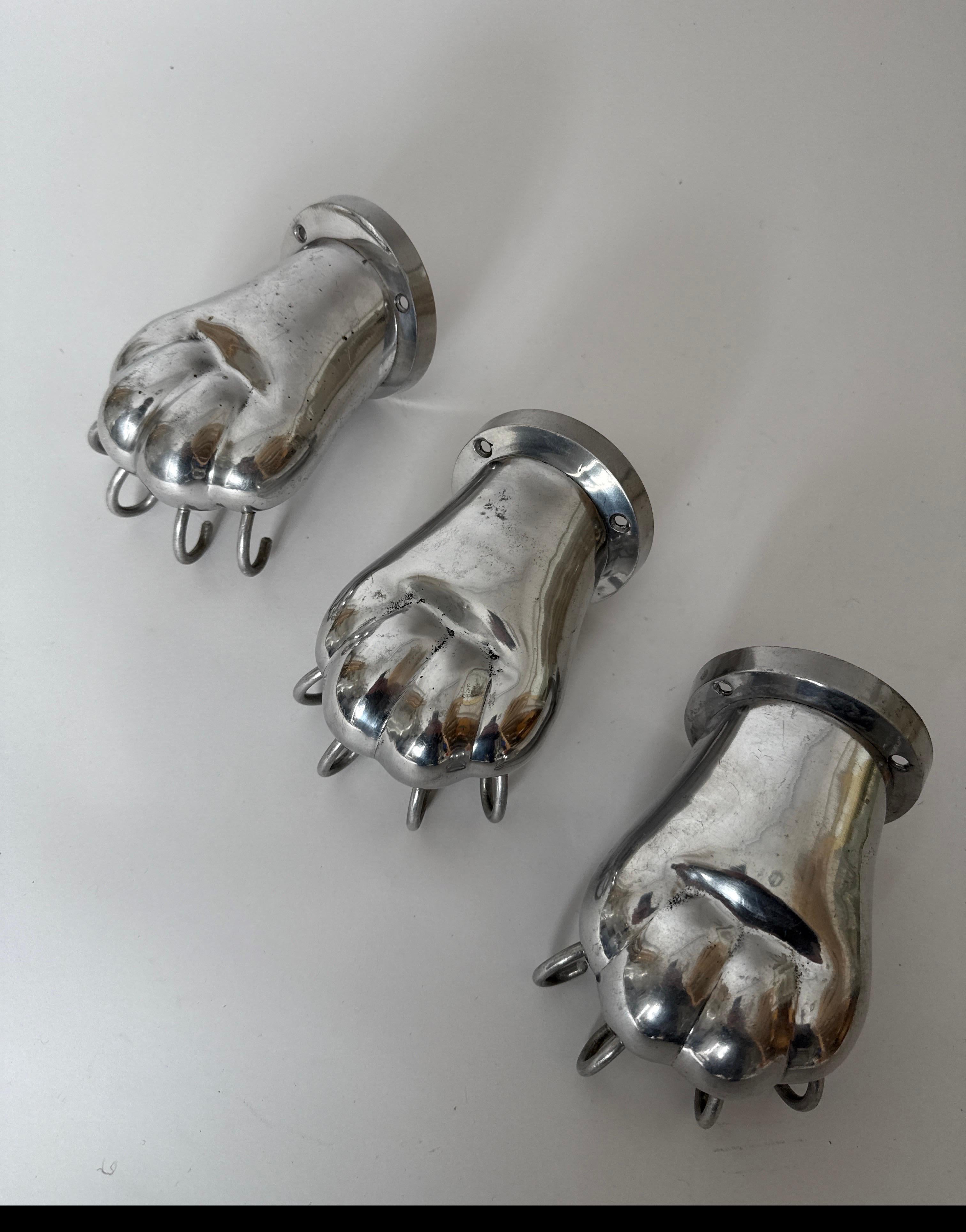 Late 20th Century Set of three Towel Holders in the shape of Lion Paws made of Polished Aluminum For Sale