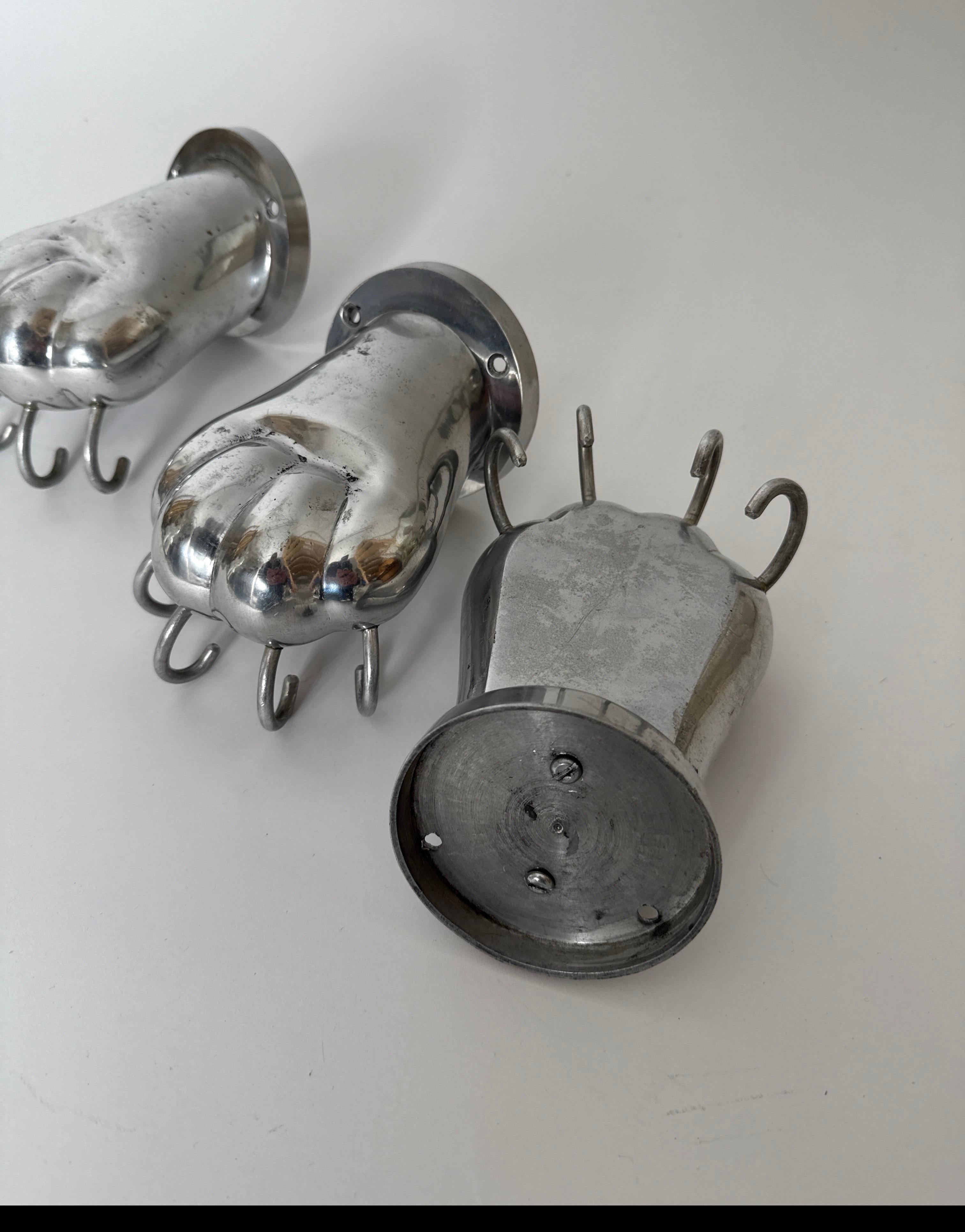 Set of three Towel Holders in the shape of Lion Paws made of Polished Aluminum For Sale 1