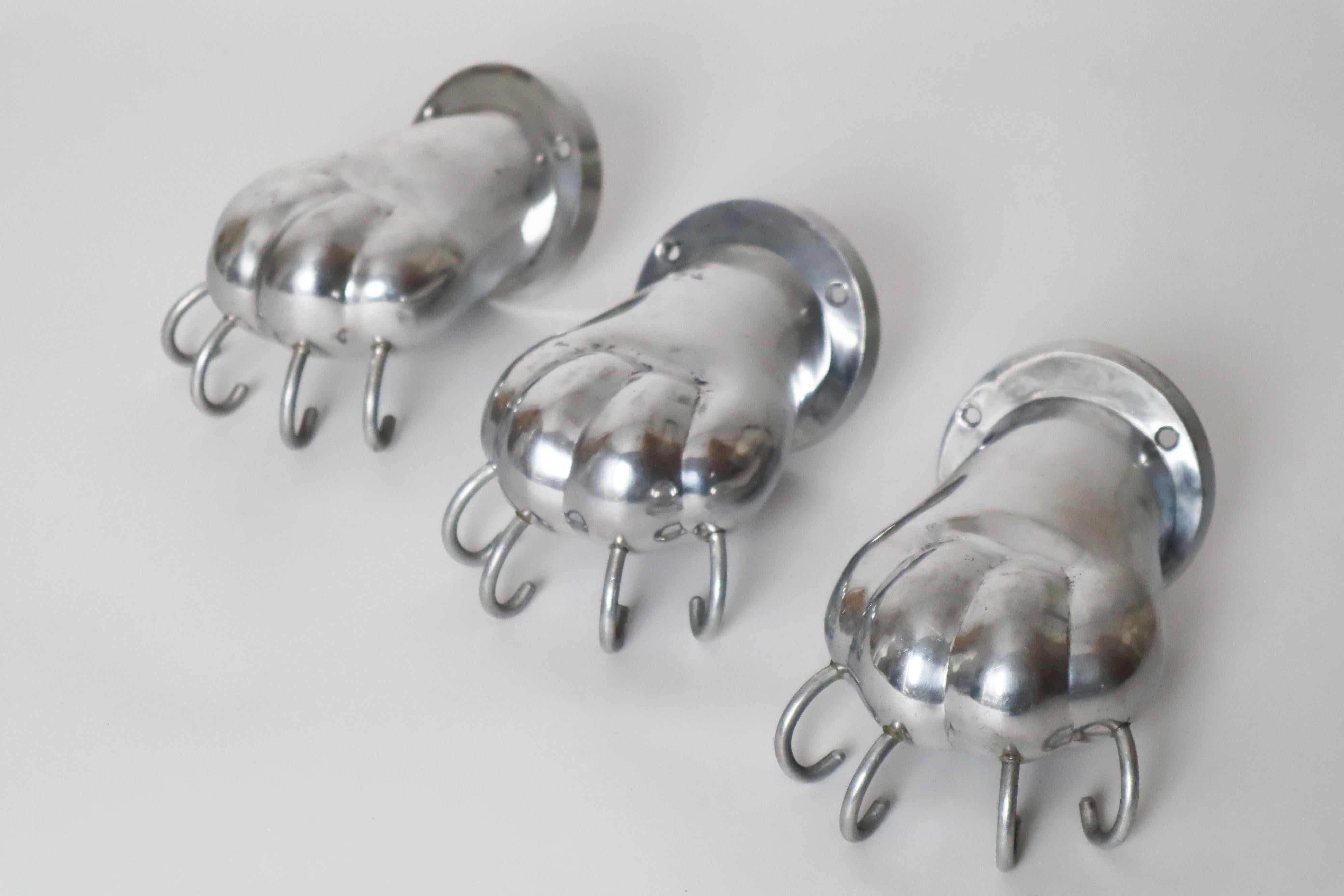 Set of three Towel Holders in the shape of Lion Paws made of Polished Aluminum For Sale 3