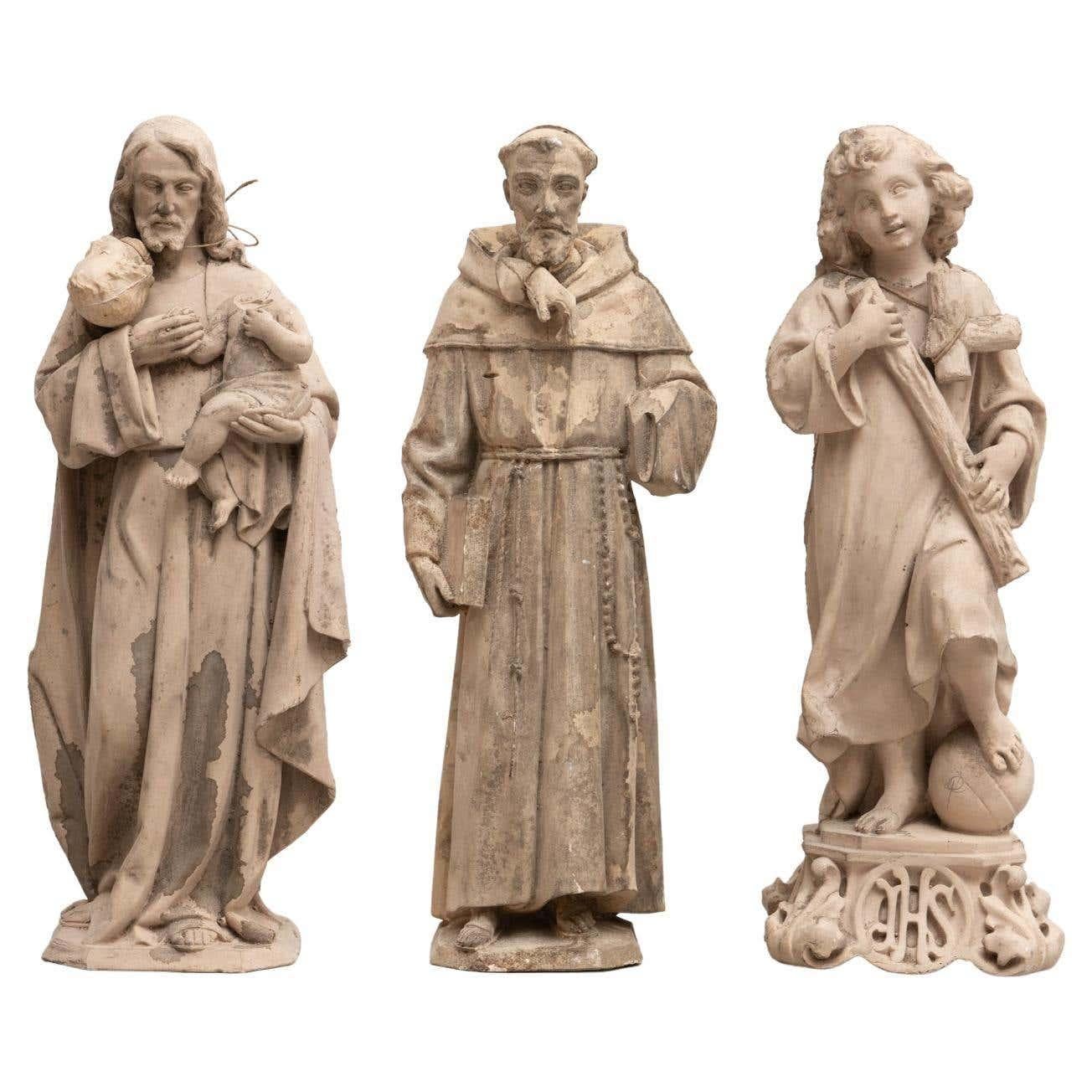 Set of 3 traditional religious plaster figures.

Made in traditional Catalan atelier in Olot, Spain, circa 1950.

In original condition, with minor wear consistent with age and use, preserving a beautiful patina.

Olot has a long tradition in