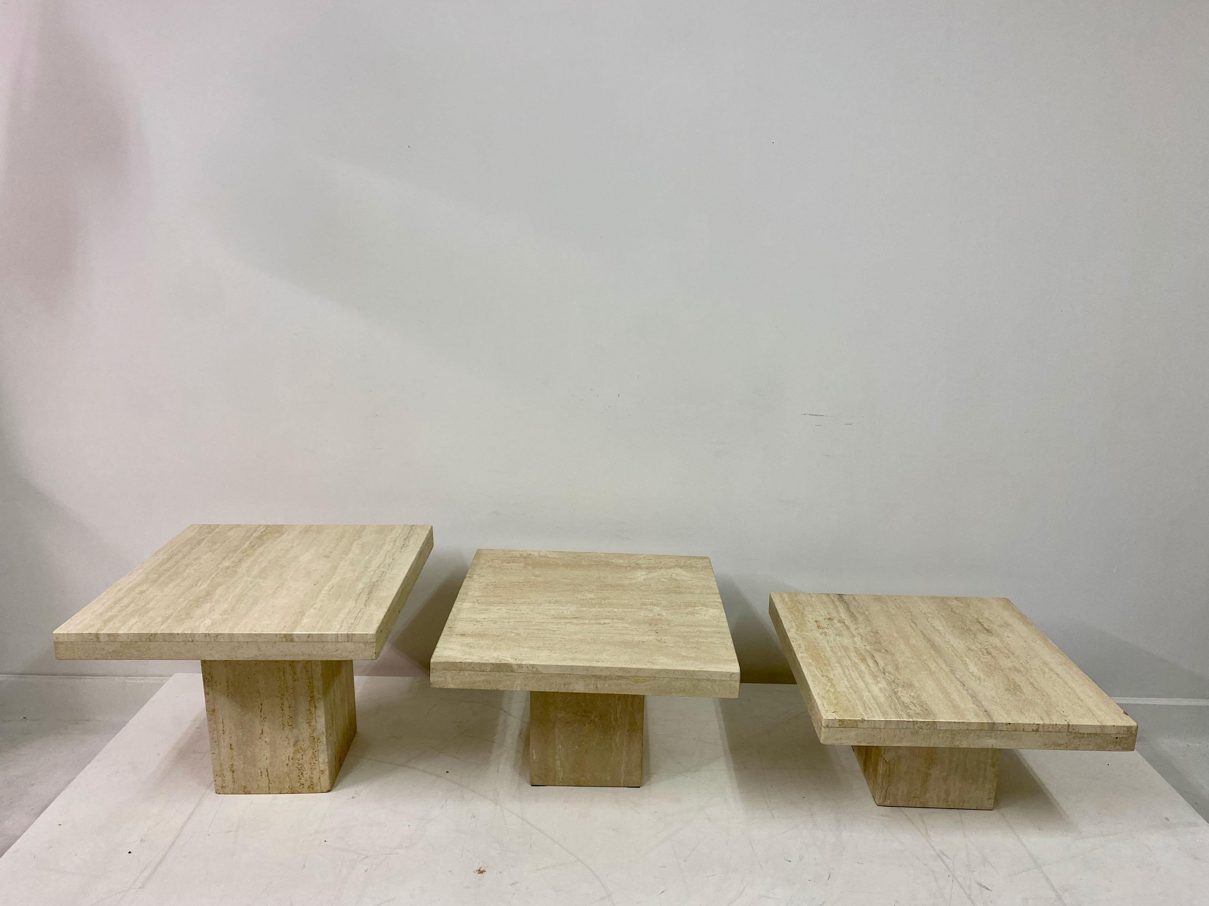Set of three side tables

Travertine

Varying heights

Can be configured in different ways

Measures: Heights are 47cm, 39cm and 31cm

1980s Italy.