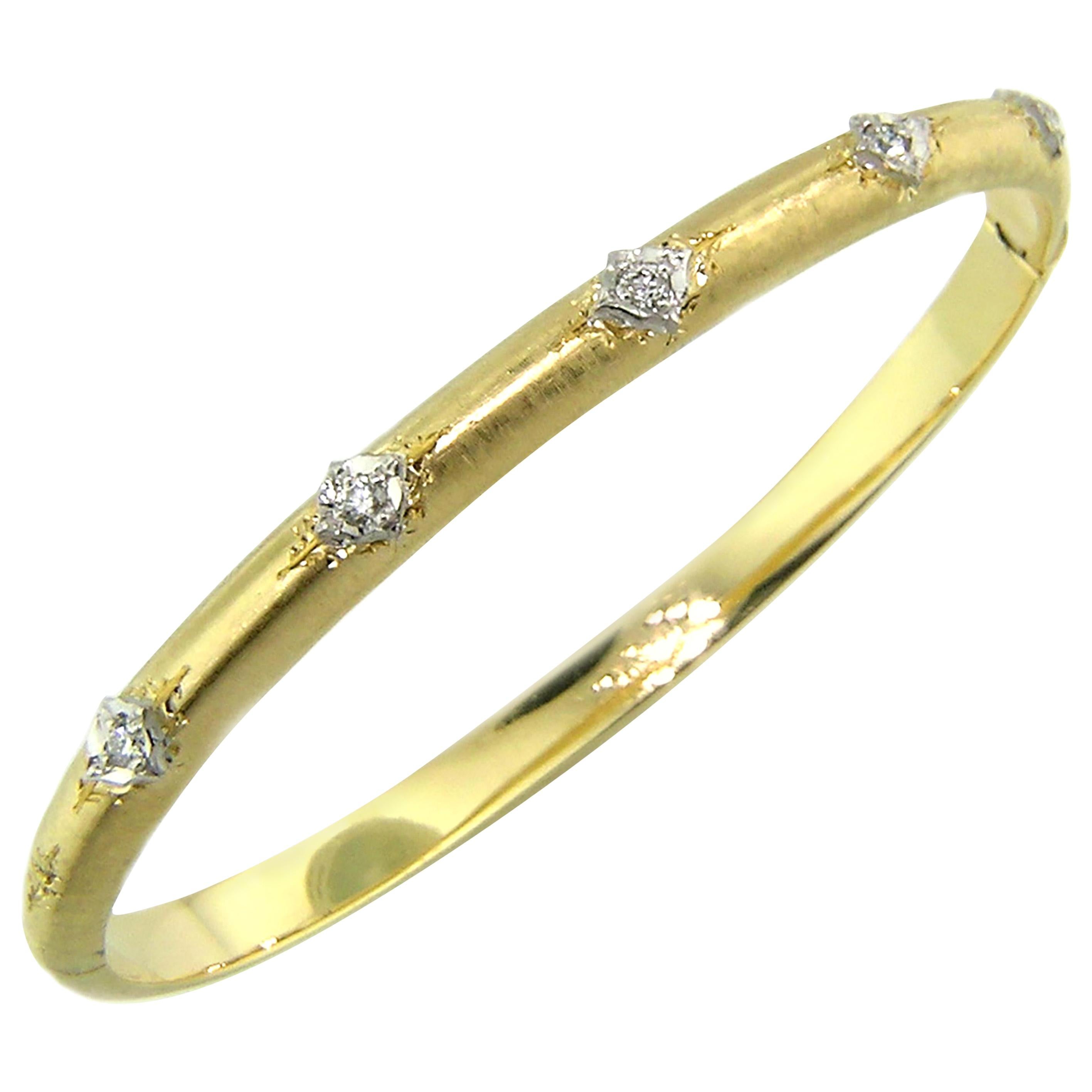 SET OF THREE: One yellow, one rose, one white gold.

The Andrea Bangle will be your perfect everyday favorite. Sumptuous details and gorgeous diamonds are framed in an oval bangle which is perfect for everyday wear. This style is at once classical