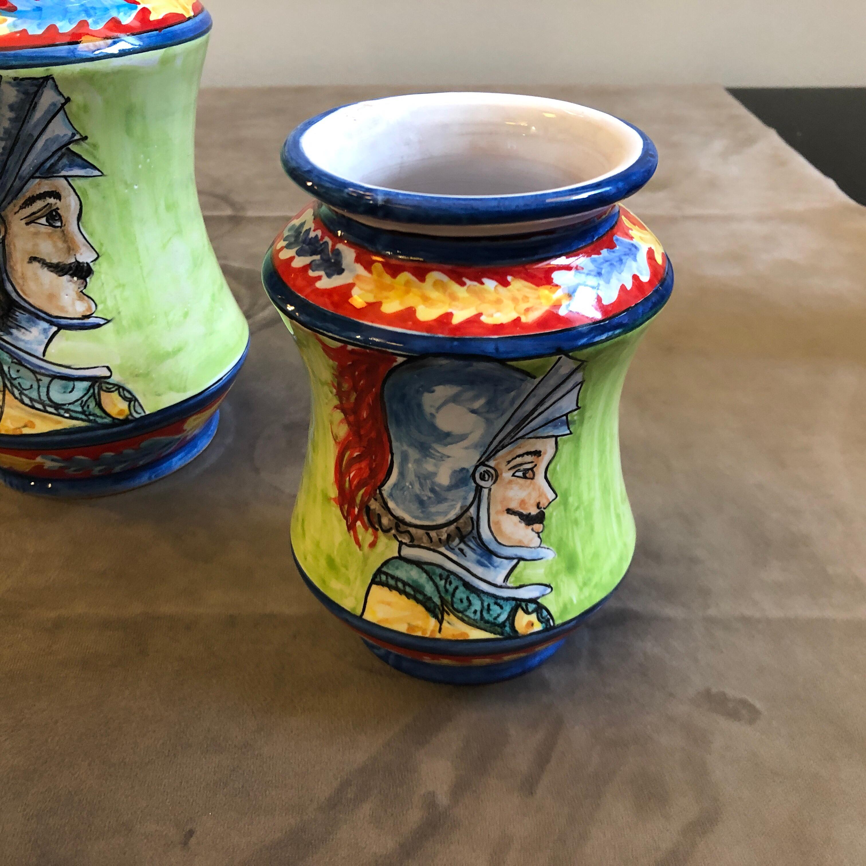 Three hand painted terracotta vases made in Sicily, they are unique pieces especially made for our shop and signed on the bottom. In the past, the Albarello vase was made to contain medical herbs, They are decorated with faces of paladins Orlando