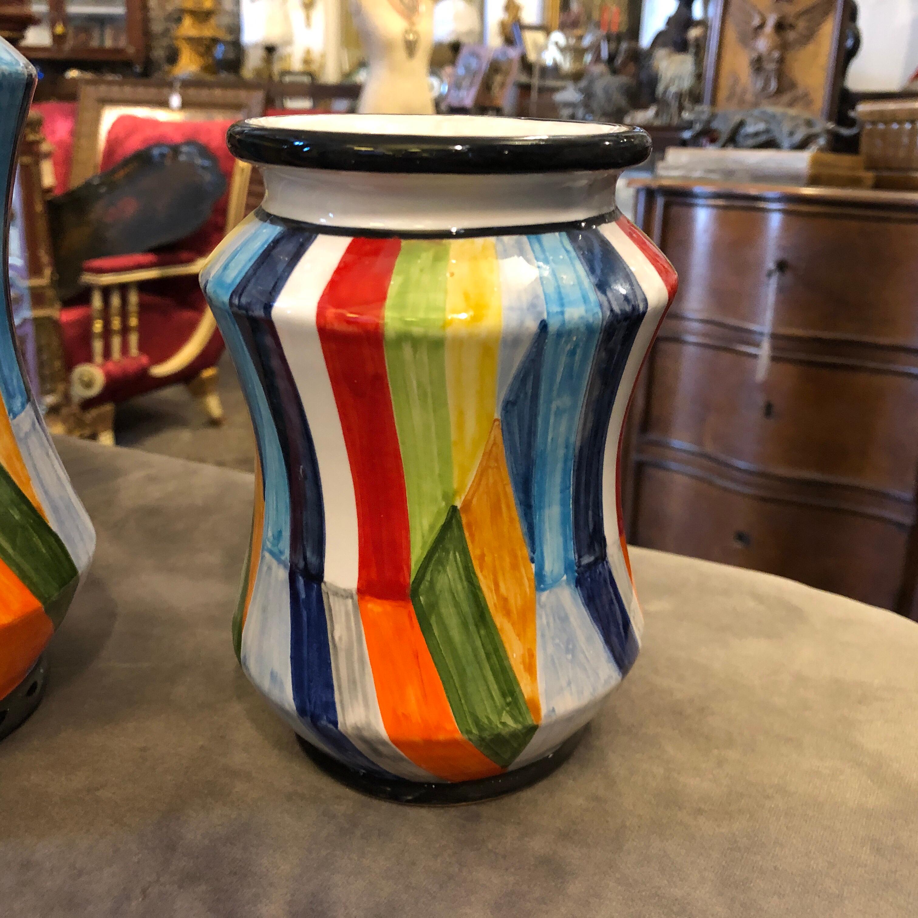 Three Sicilian vases totally hand painted made exclusively for our shop. They are unique pieces signed on the bottom Antiques fuori le mura. It's a revisiting of antique pharmacy vases with a Mid-Century Modern decor. Dimensions are of the largest.