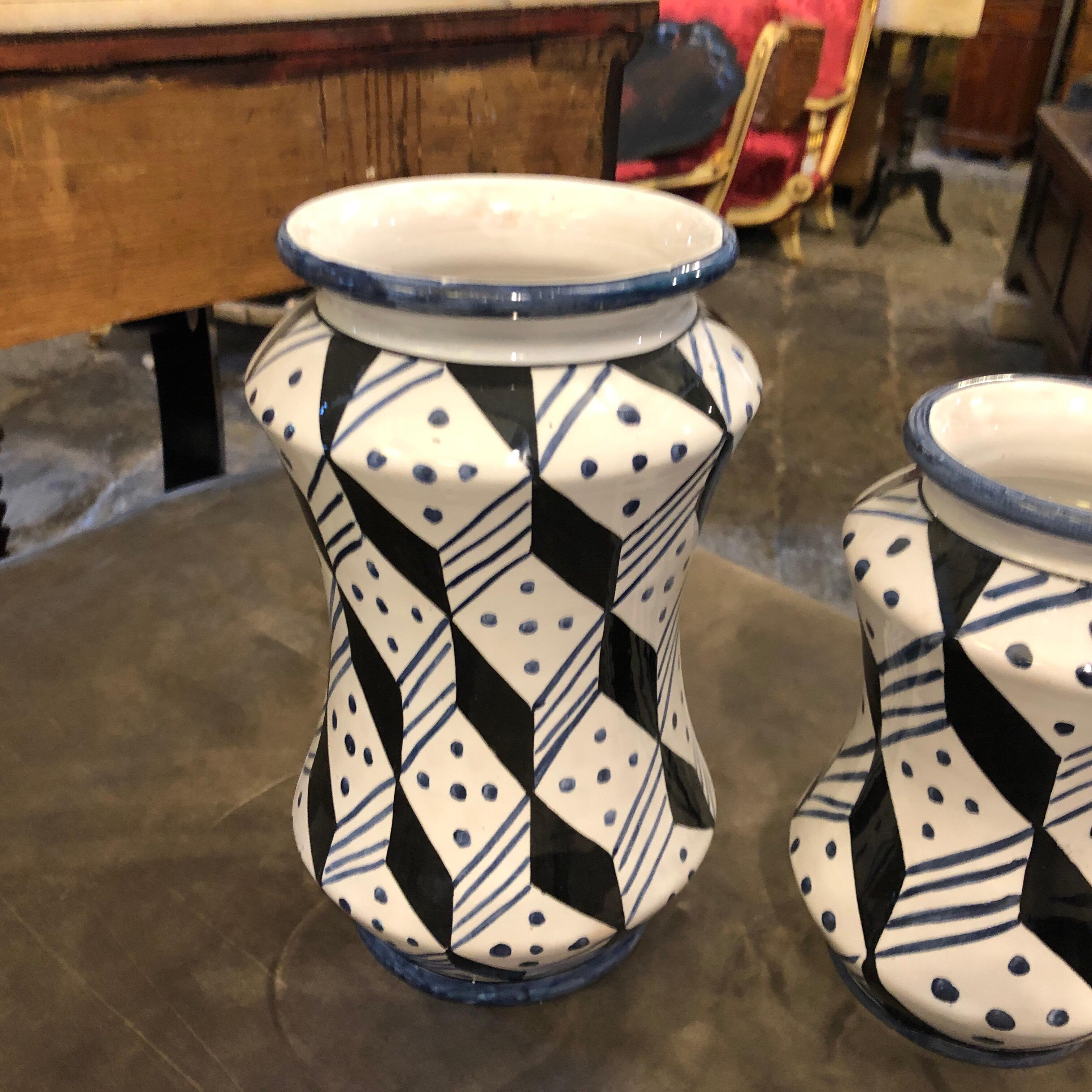 Three Sicilian vases named Alberello totally hand painted made exclusively for our shop. They are unique pieces signed on the bottom Antiques fuori le mura. It's a revisiting of antique pharmacy vases with a blue, black and white art deco decoration