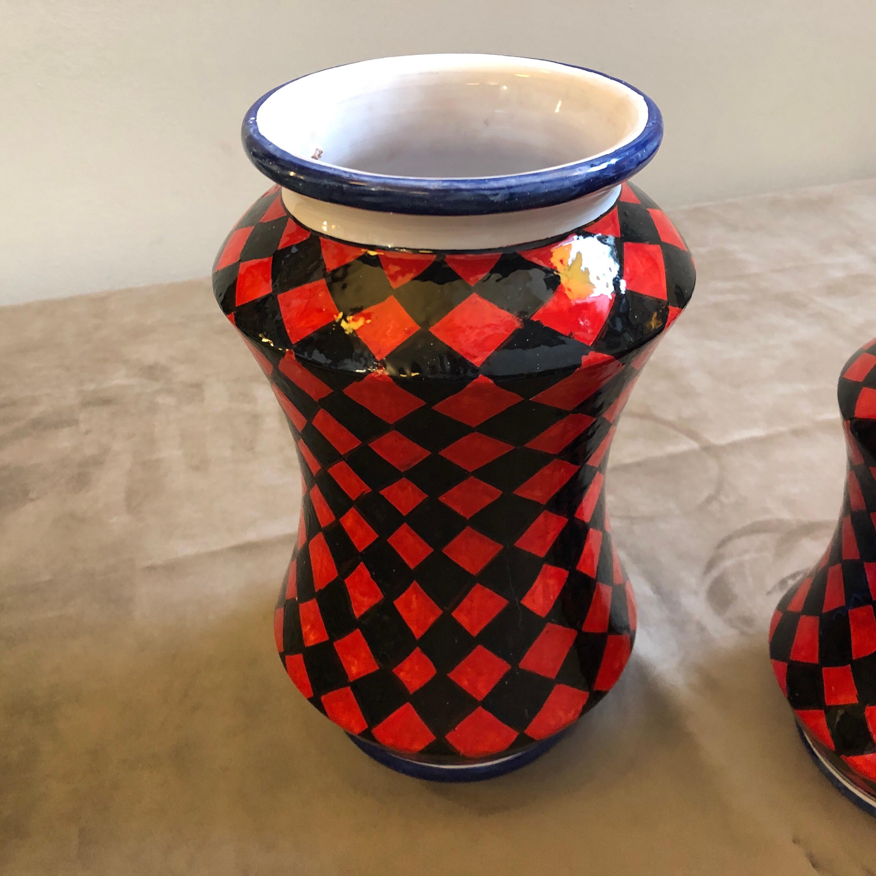 Three hand painted terracotta vases made in caltagirone, small town in Sicily famous for hand crafted ceramics, they are unique pieces especially made for our shop and signed on the bottom. In the past, the Albarello vase was made to contain medical