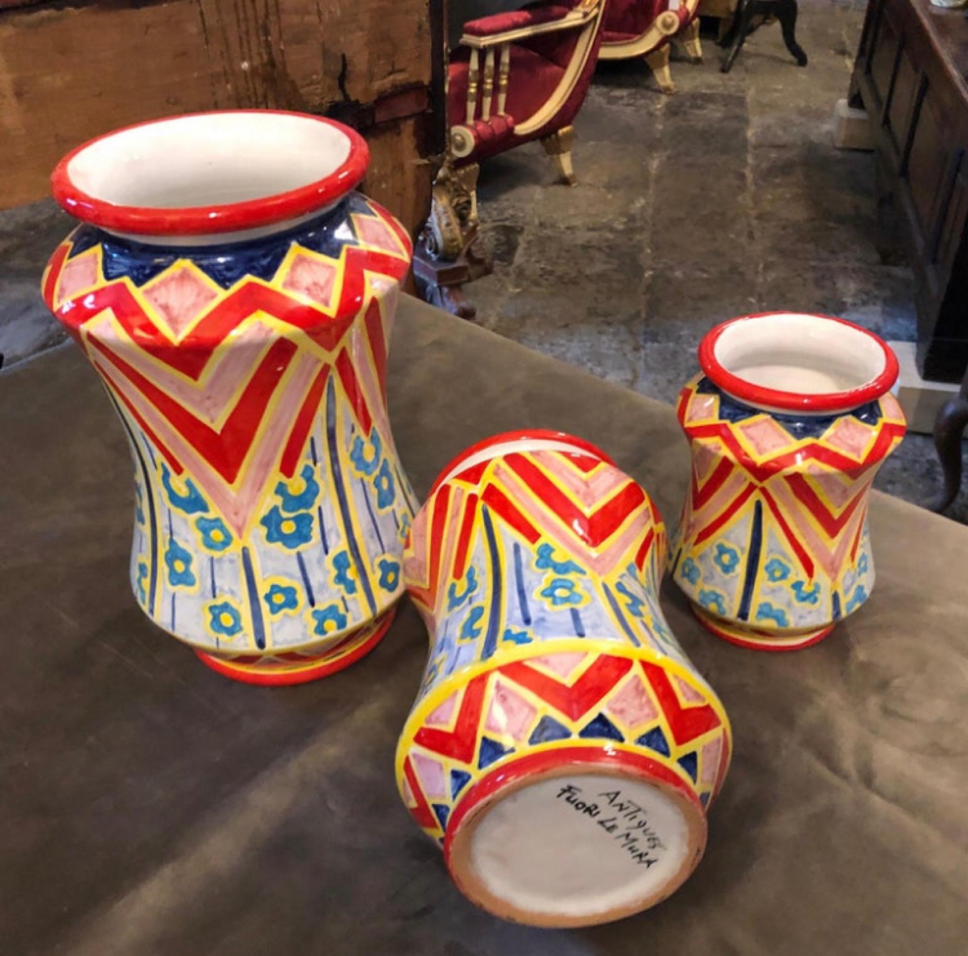 Three terracotta vases made in Sicily, they are unique pieces especially made for our shop and signed on the bottom. In the past, the Albarello vase was made to contain medical herbs, they are hand painted with an Art Deco decoration.
Dimensions: