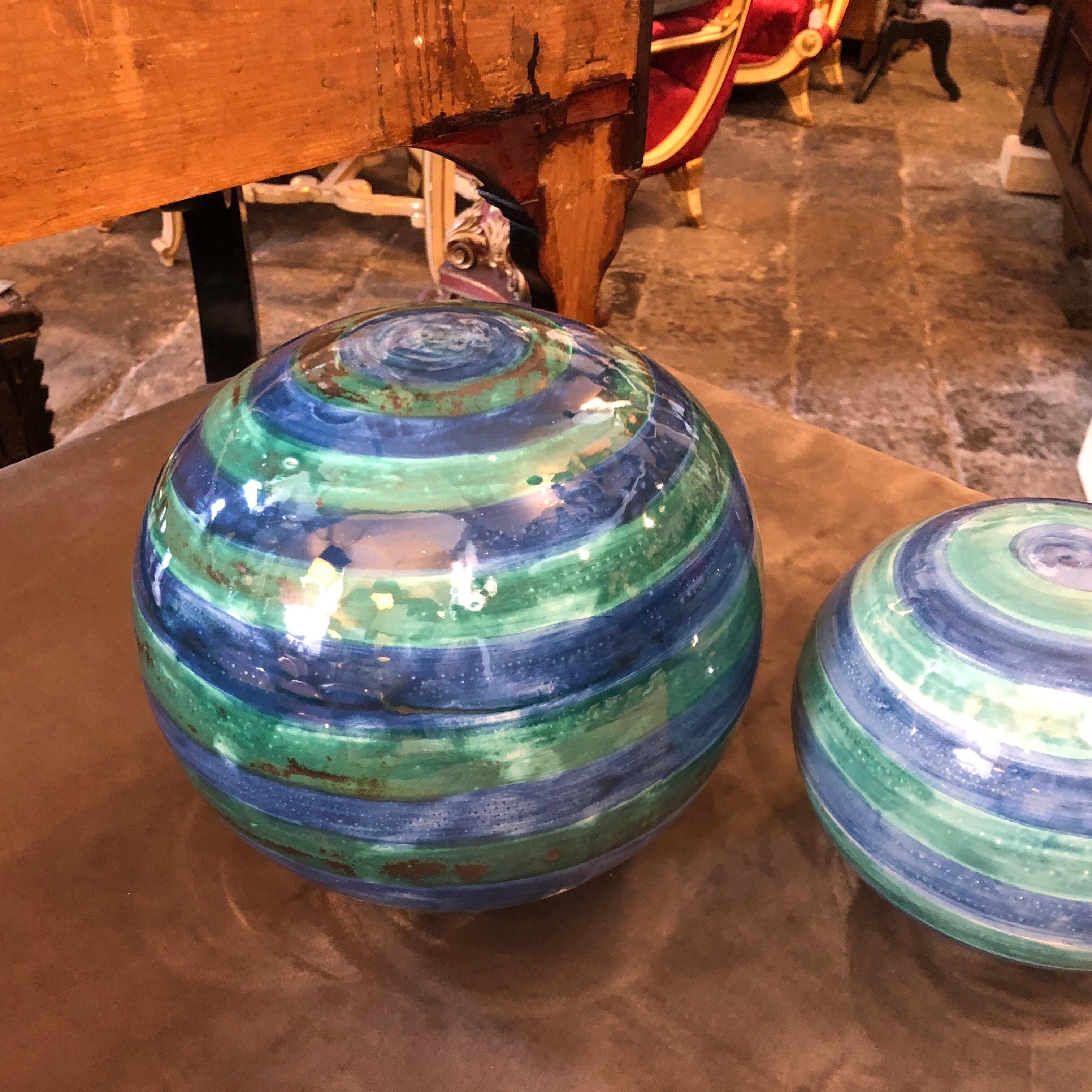 Three spheres made in Sicily, in the small town of Caltagirone, world famous for handcrafted ceramics. They are especially made for our store and are unique pieces. Measures: Diameter of the medium sphere is 14 cm, the small one is 9 cm diameter.