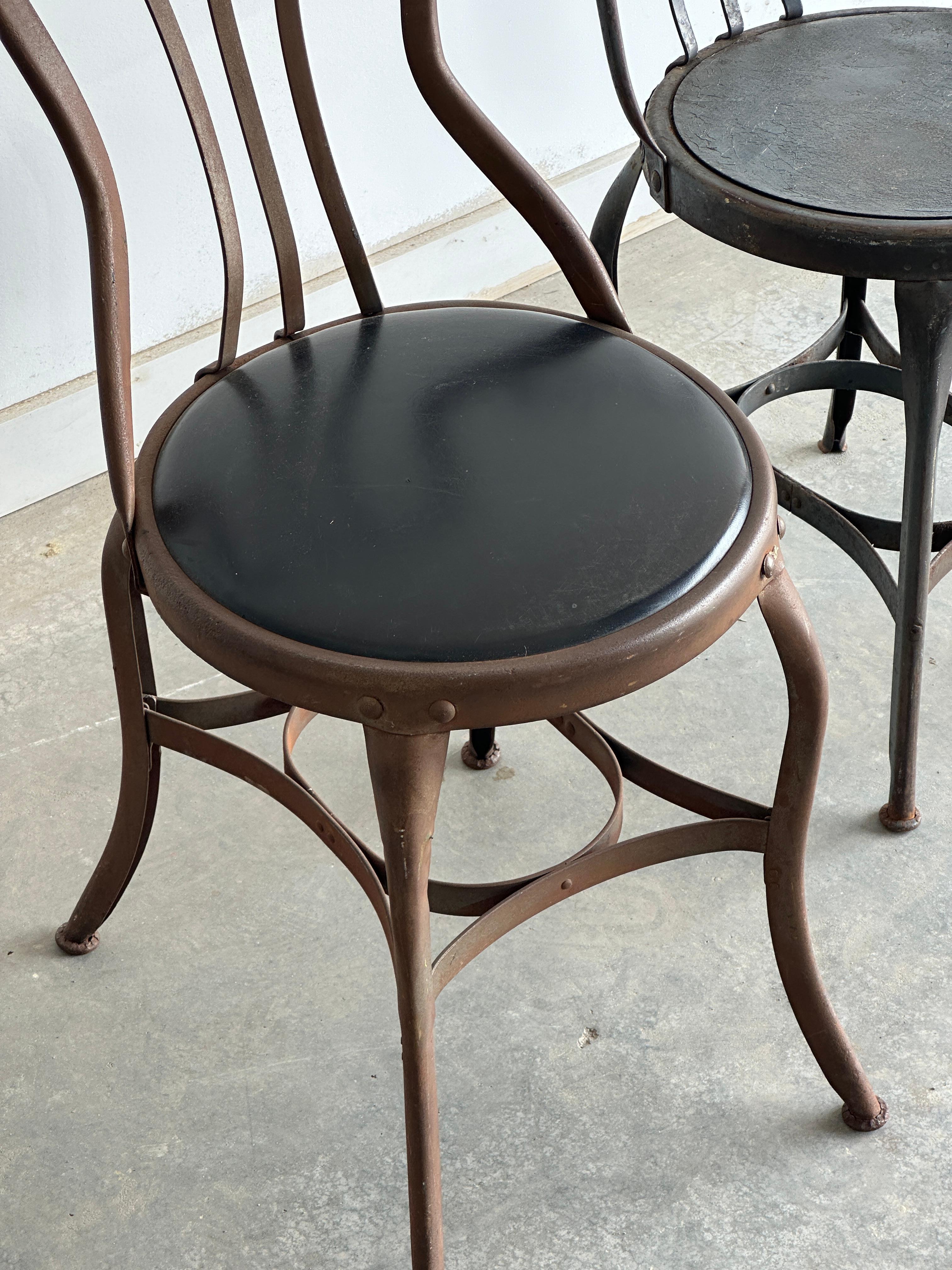 Set of three varying UHL patinated metal cafe bistro dining chairs For Sale 2