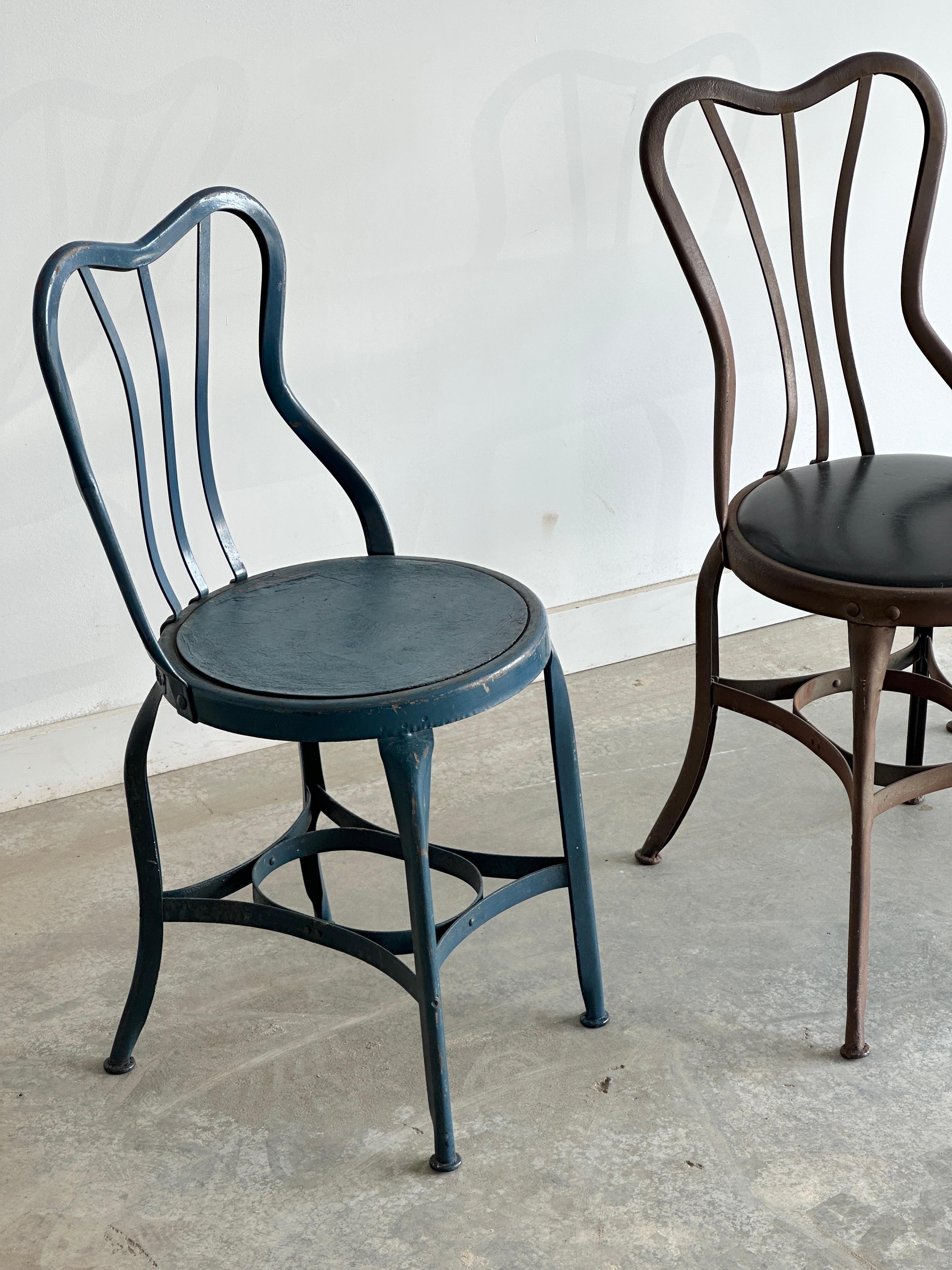 Set of three varying UHL patinated metal cafe bistro dining chairs In Distressed Condition For Sale In Kleinburg, ON